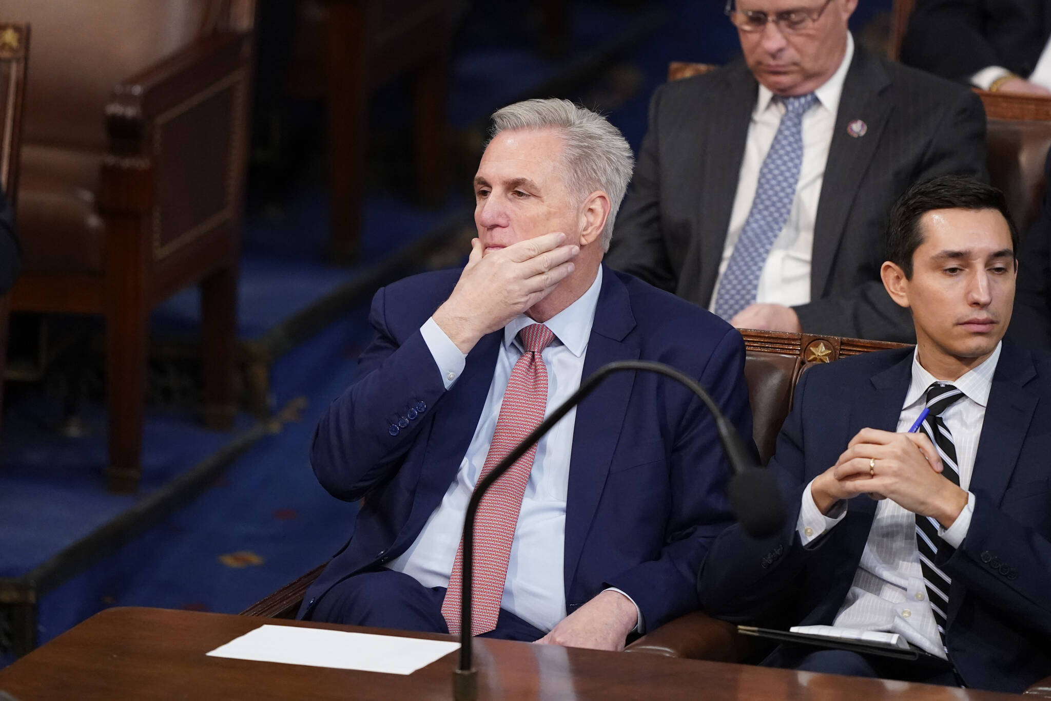 Rep. Kevin McCarthy, R-Calif., listens as the second round of votes are cast for the next Speaker of the House on the opening day of the 118th Congress at the U.S. Capitol, Tuesday, Jan. 3, 2023, in Washington.(AP Photo/Alex Brandon)