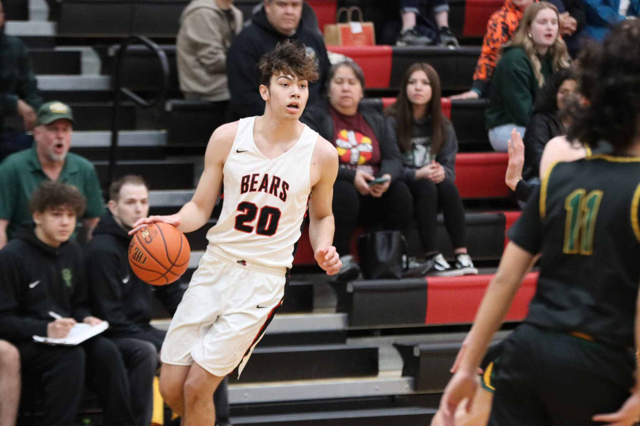 JDHS senior forward Orion Dybdahl looks to take a shot against Service High School on Wednesday night. Dybdahl led the Crimson Bears in scores with a total of 16 points in game one of two against Service. (Jonson Kuhn / Juneau Empire)