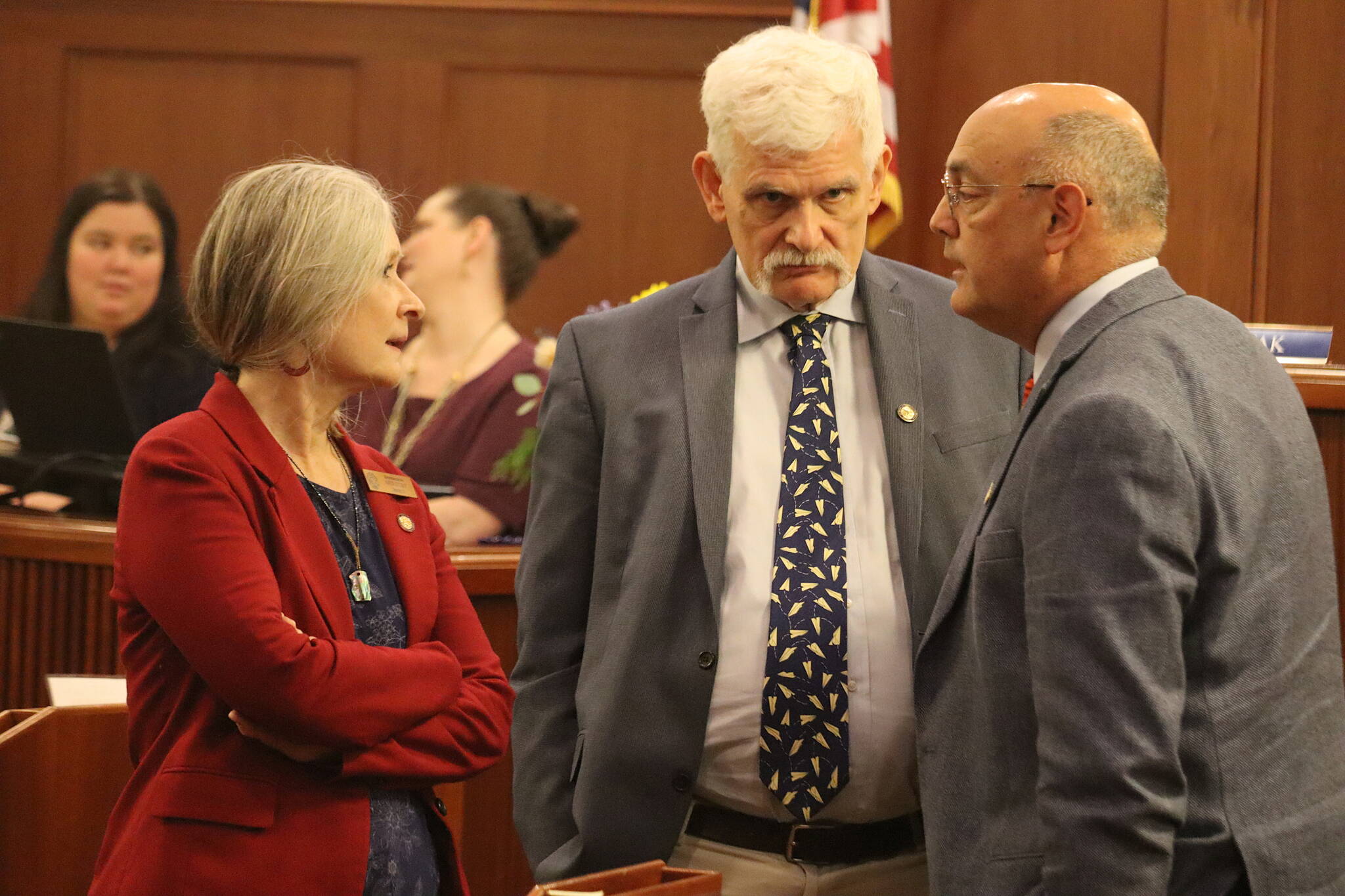 State Rep. Andi Story, D-Juneau, meets with representatives Cliff Groh, D-Anchorge, and Andy Josephson, D-Anchorage, during a break in the House floor session Wednesday. Story was one of two Democrats to vote for Rep. Cathy Tilton, R-Wasilla, as speaker, although the Juneau lawmaker is not part of the current majority.(Mark Sabbatini / Juneau Empire)