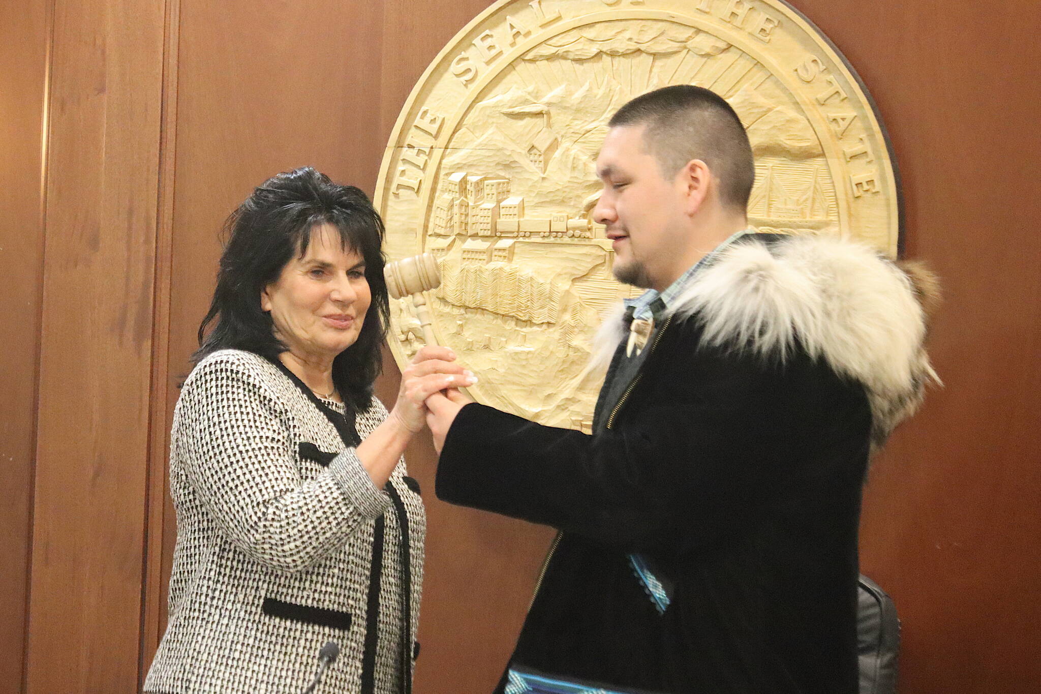 State Rep. Cathy TIlton, R-Wasilla, takes to gavel from State Rep. Josiah Patkotak, I-Utqiaġvik, after she is elected speaker of the Alaska State House on Wednesday. She was elected by a 26-14 bipartisan vote, but the initial majority consists of 19 Republicans and four members of the Bush Caucus. (Mark Sabbatini / Juneau Empire)