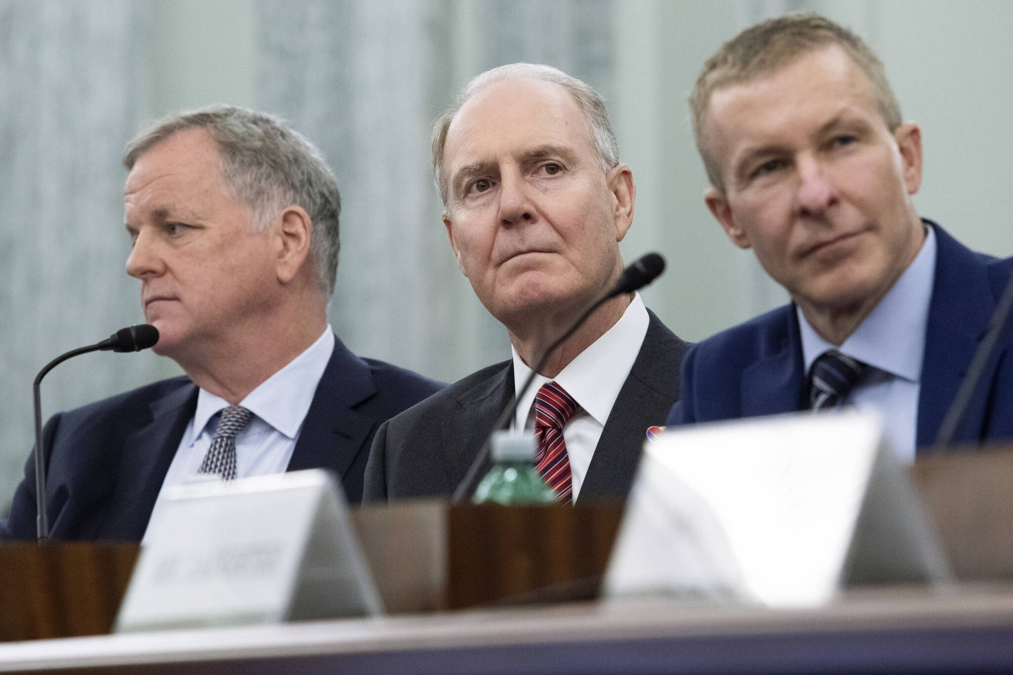 From left, American Airlines CEO Doug Parker, Southwest Airlines CEO Gary Kelly and United Airlines CEO Scott Kirby testify before the Senate Commerce, Science, and Transportation in the Russell Senate Office Building on Capitol Hill on Dec. 15, 2021 in Washington. Kirby said Wednesday, Jan. 18, 2023, that other airlines won’t be able to handle all the flights they plan to operate this year, leading to more disruptions for travelers. (Tom Brenner/The Washington Post)