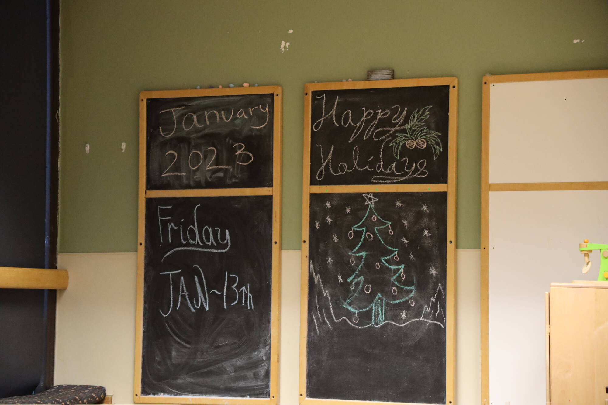 Clarise Larson / Juneau Empire 
A chalkboard hangs on a wall at the downtown Gold Creek Child Development Center still reads the date as Friday, Jan. 13 days after the center’s temporary closure.