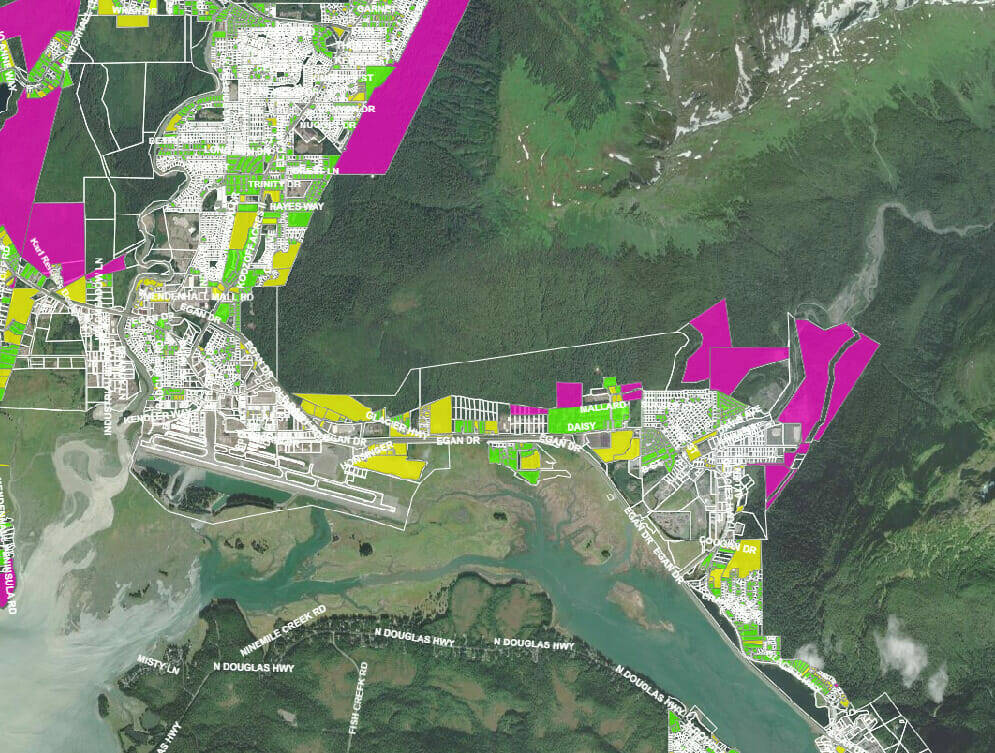 This image is a screen grab of an interactive online map that outlines the different pieces of vacant and underdeveloped property in Juneau. According to the map website, privately owned vacant parcels are highlighted yellow, CBJ Lands and Resources owned vacant parcels are highlighted pink and private developed properties below maximum allowable housing density are highlighted green. (Courtesy / City and Borough of Juneau)