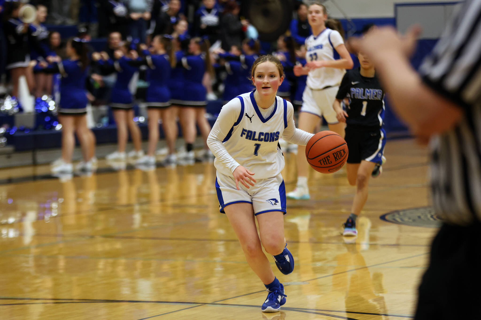Freshman Cambry Lockhart sprints down the court during a TMHS home win Saturday night. Lockhart was one of four Lady Falcons to score 9 points. She had a late steal that helped seal the outcome. (Ben Hohenstatt / Juneau Empire)