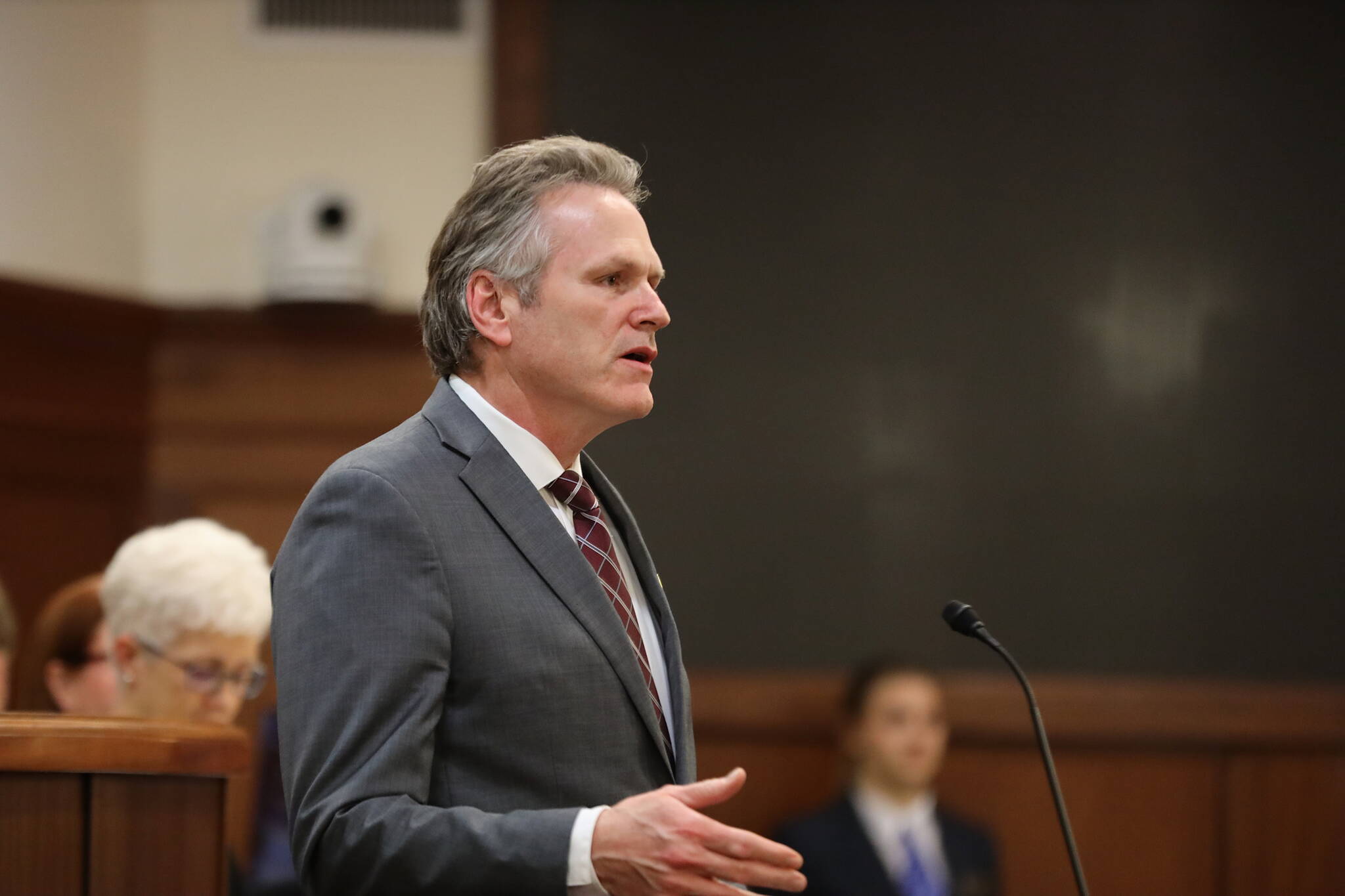 Gov. Mike Dunleavy addresses state lawmakers and guests attending his State of the State speech Monday night before a joint session of the Alaska State Legislature at the Alaska State Capitol. The 50-minute speech was praised by many legislators as more positive and less confrontational than his first address four years ago. (Clarise Larson / Juneau Empire)
Gov. Mike Dunleavy addresses state lawmakers and guests attending his State of the State speech Monday night before a joint session of the Alaska State Legislature at the Alaska State Capitol. The 50-minute speech was praised by many legislators as more positive and less confrontational than his first address four years ago. (Clarise Larson / Juneau Empire)