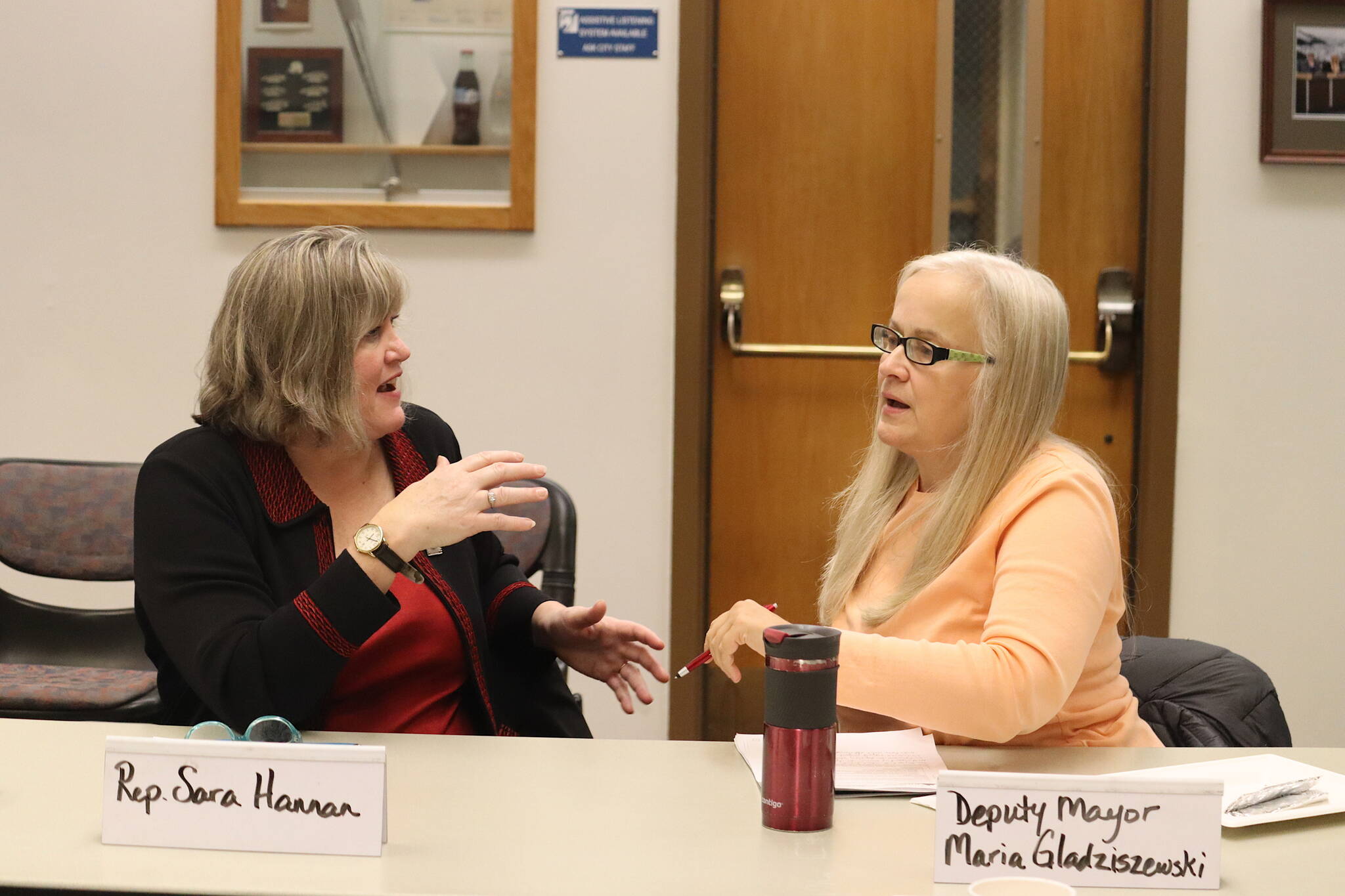 Mark Sabbatini / Juneau Empire 
State Rep. Sara Hannan, left, and Juneau Deputy Mayor Maria Gladziszewski discuss overlapping local issues following a joint meeting of the Juneau Assembly and local state legislative delegation Thursday morning.