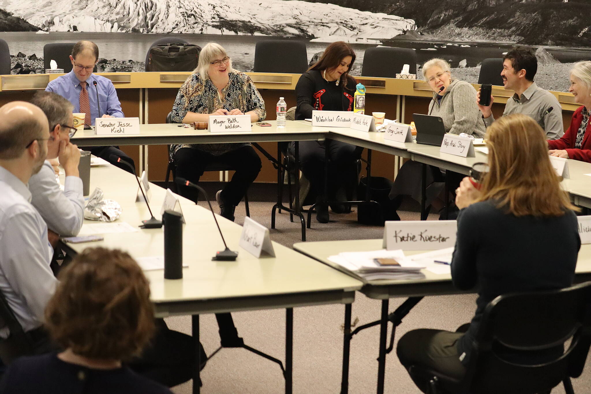Juneau’s municipal and state legislative members, their staff, and city lobbyists gather in the Assembly chambers Thursday meeting for an overview of how the Alaska State Legislature and politicians in Washington, D.C., are affecting local issues. (Mark Sabbatini / Juneau Empire)