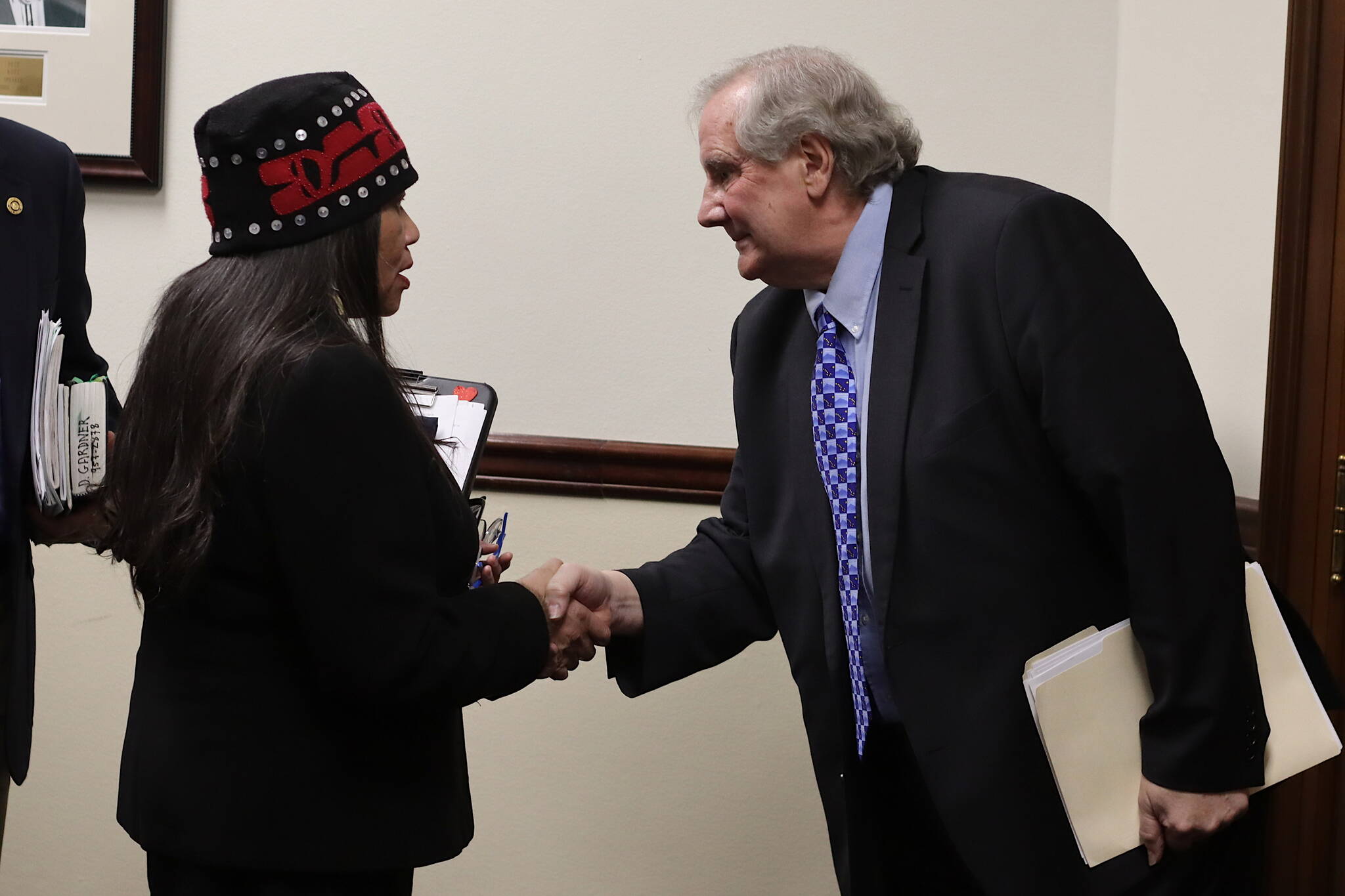 Paulette M. Moreno, left, a former grand president of the Alaska Native Sisterhood greets Alaska Supreme Court Chief Justice Daniel Winfree after his State of the Judiciary speech on Wednesday at the Alaska State Capitol. The chief justice spent a prolonged period after the speech in the hallway outside the House chamber greeting lawmakers and people in the audience who attended the speech. (Mark Sabbatini / Juneau Empire)