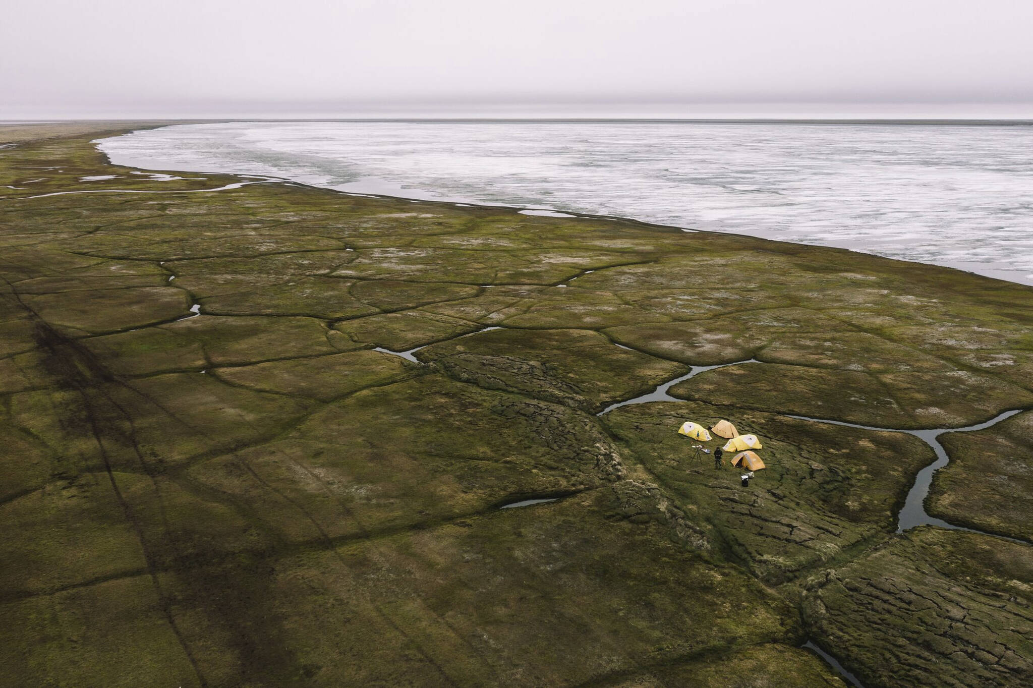 This Sunday, June 30, 2019, aerial photo released by Earthjustice shows the Alaska’s North Slope in the Western Arctic on the edge of Teshekpuk Lake, Alaska. The Biden administration issued a long-awaited study on Wednesday, Feb. 1, 2023, that recommends allowing a major oil development on Alaska’s North Slope, and the move — while not final — drew immediate anger from environmentalists who saw it as a betrayal of the president’s pledges to reduce carbon emissions and promote clean energy sources. (Kiliii Yuyan for Earthjustice via AP)