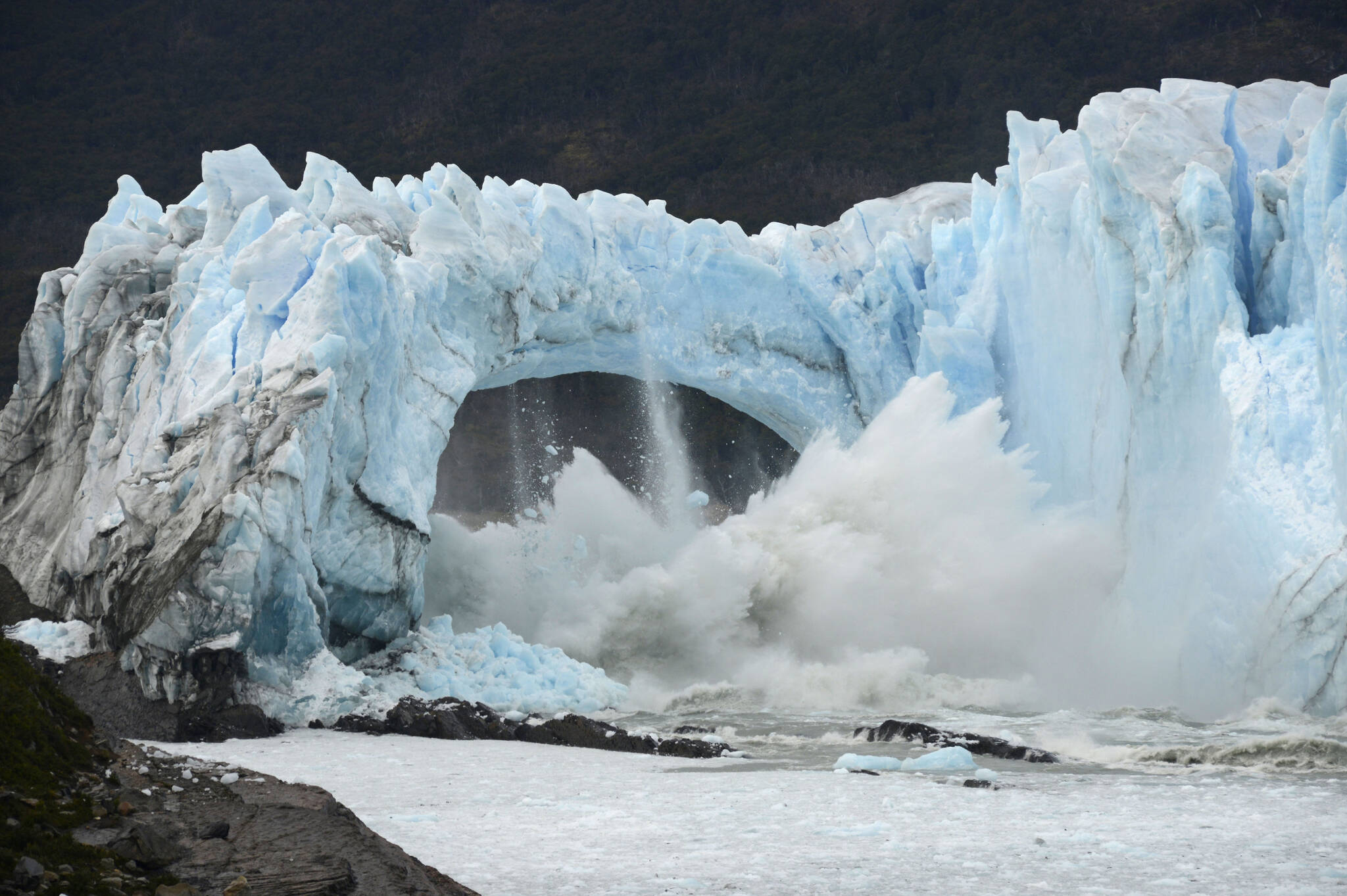 Chunks of ice break off the Perito Moreno Glacier, in Lake Argentina, at Los Glaciares National Park, near El Calafate, in Argentina's Patagonia region, March 10, 2016. As glaciers melt and pour massive amounts of water into nearby lakes, 15 million people across the globe live under the threat of a sudden and deadly outburst flood, a new study finds. (AP Photo / Francisco Munoz)