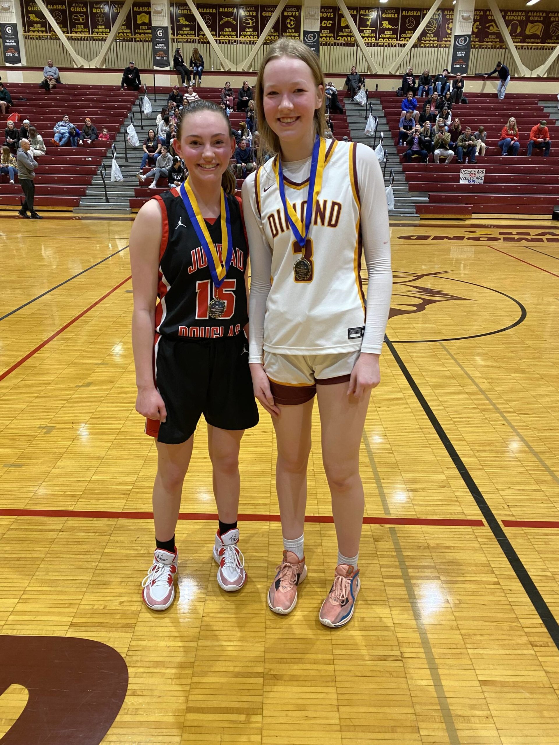 Courtesy Photo / Tanya Nizich 
JDHS freshman Gwen Nizich, left, poses after earning Player of the Game on Saturday against Dimond High School.