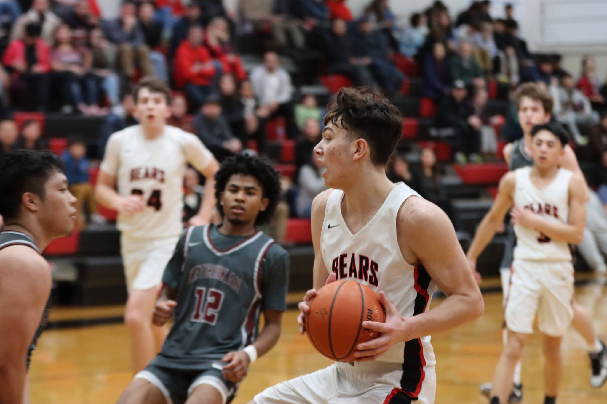 JDHS senior Orion Dybdahl comes in for a lay up during the second conference game at home against Ketchikan High School on Saturday night. Dybdahl led his team in scores for a total of 23 points. (Jonson Kuhn / Juneau Empire)