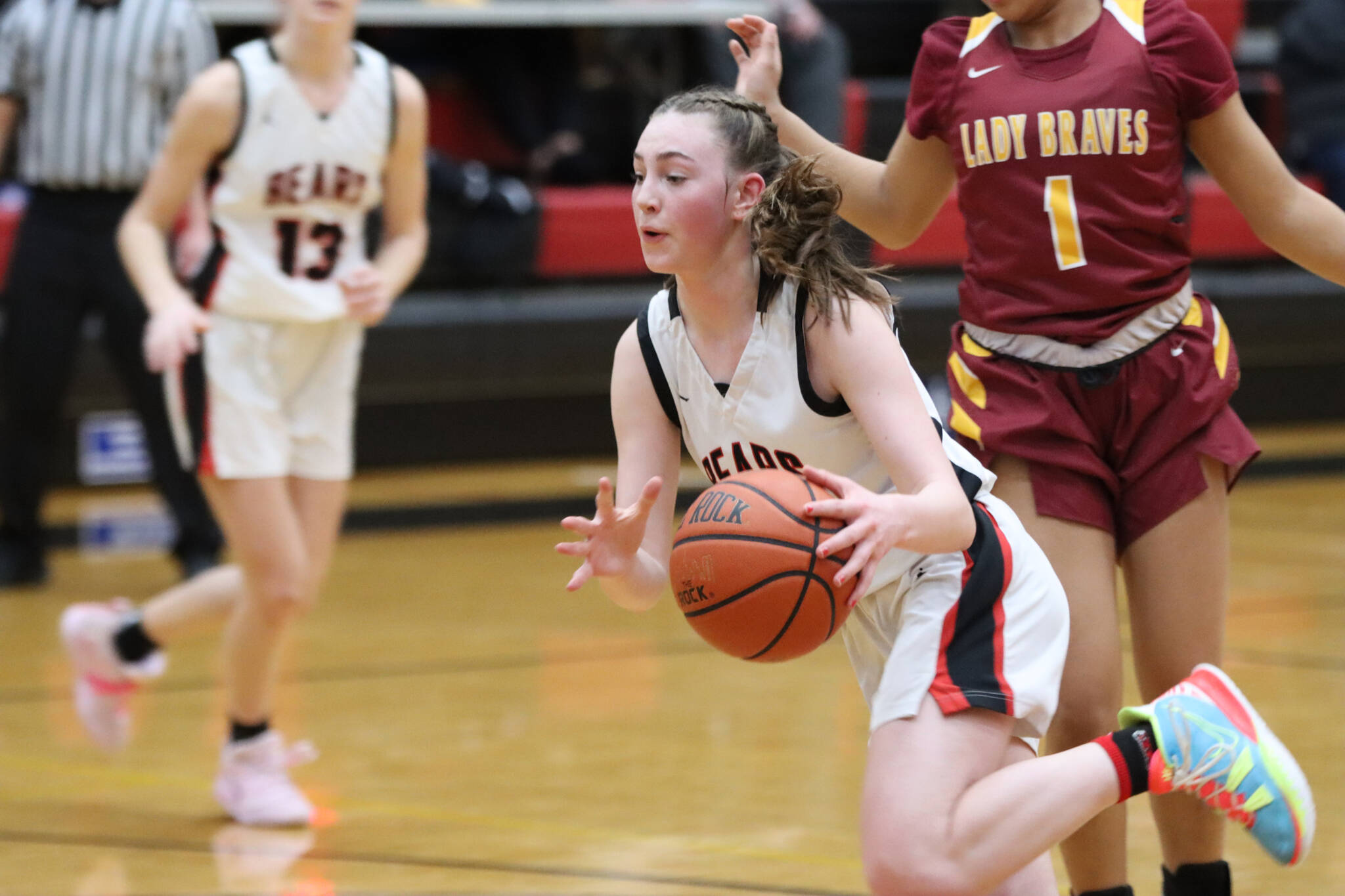 JDHS freshman Gwen Nizich drives the lane for a 2-point shot on Saturday in the second game against Mt. Edgecumbe at home. Nizich finished with a total of 11 points. (Jonson Kuhn / Juneau Empire)