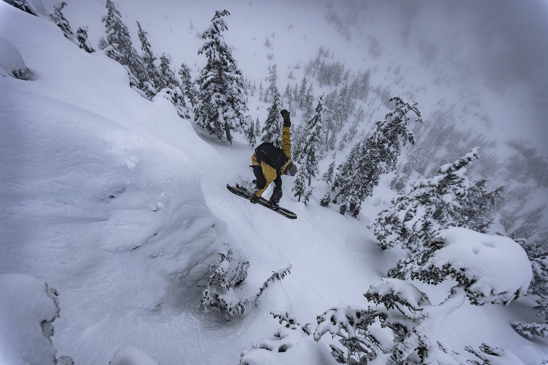 Mark Rainery riding backcountry trails of Southeast as part of his latest collaborative snowboarding film, “The Outliers,” which premiered on Feb. 11 at the Hangar Ballroom in Juneau. (Courtesy Photo / Scott Baxter)