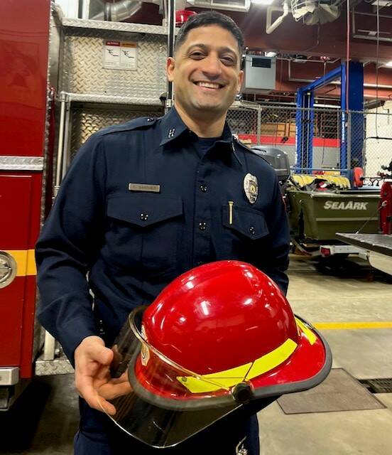 Courtesy Photo / CCFR 
CCFR Captain Cheyenne Sanchez poses for a photo on Wednesday during his promotional ceremony where his badge was pinned by friends and family.
