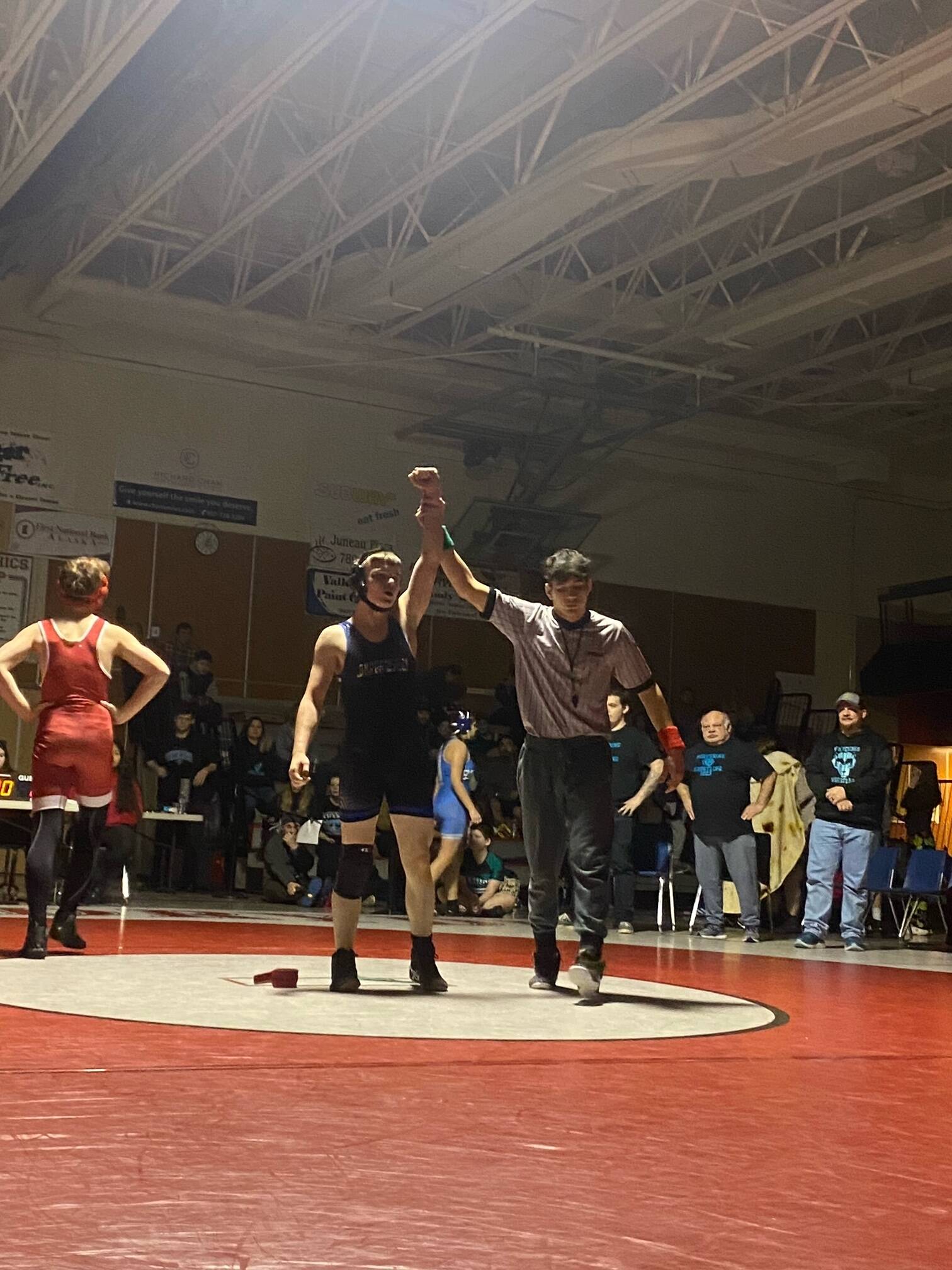 Dzantik’i Heeni Middle School team captain Ethan VanKirk takes first place against Everett Meissner of the Stikine Wolves on Saturday during the Southeast Alaska Middle School Regional Wrestling Tournament at Floyd Dryden Middle School. (Courtesy Photo / Jason Hass)