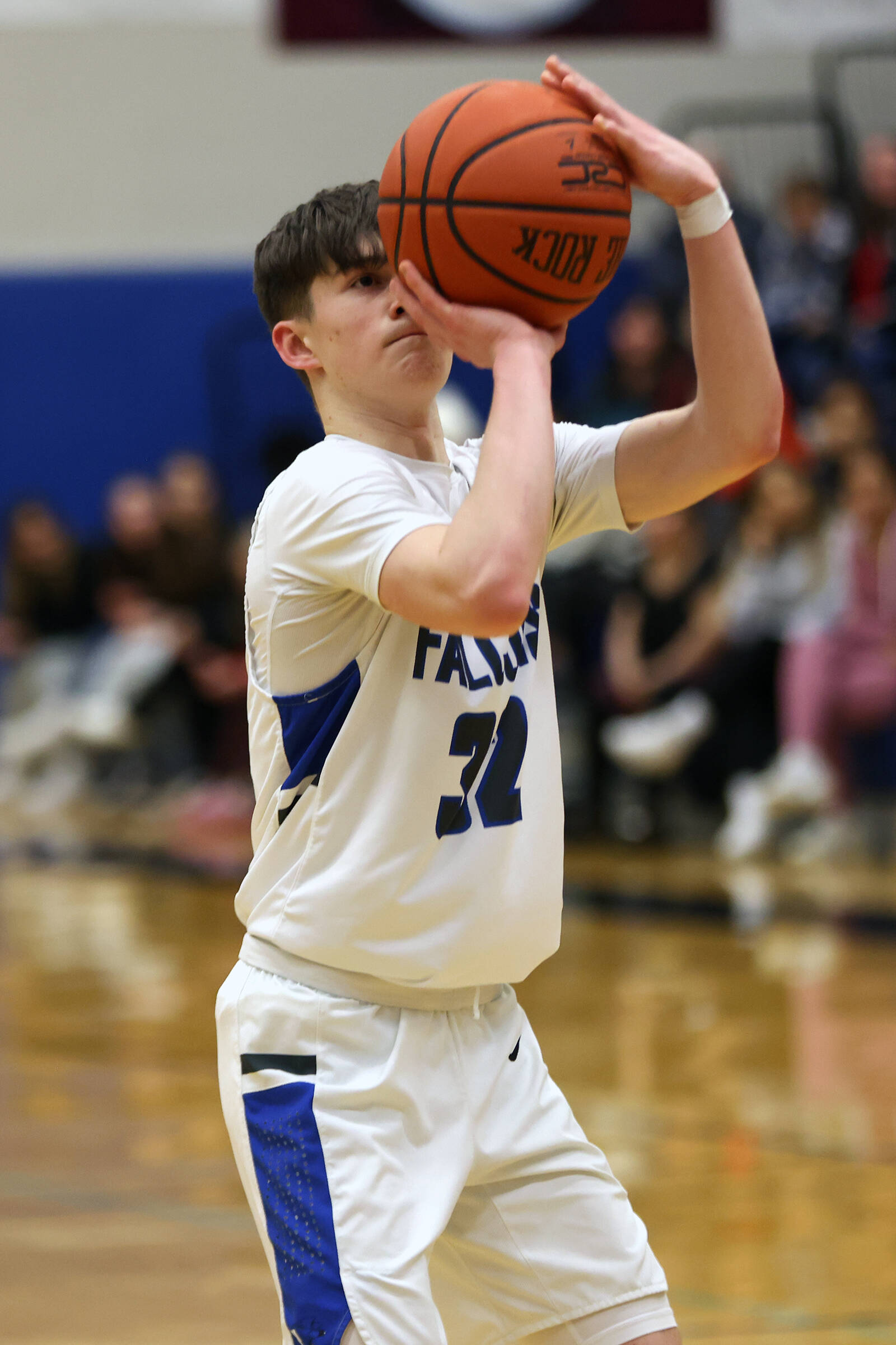 TMHS junior Samuel Lockhart dons a larger teammate's jersey while knocking down a free throw late in a home win against Ketchikan. (Ben Hohenstatt / Juneau Empire)