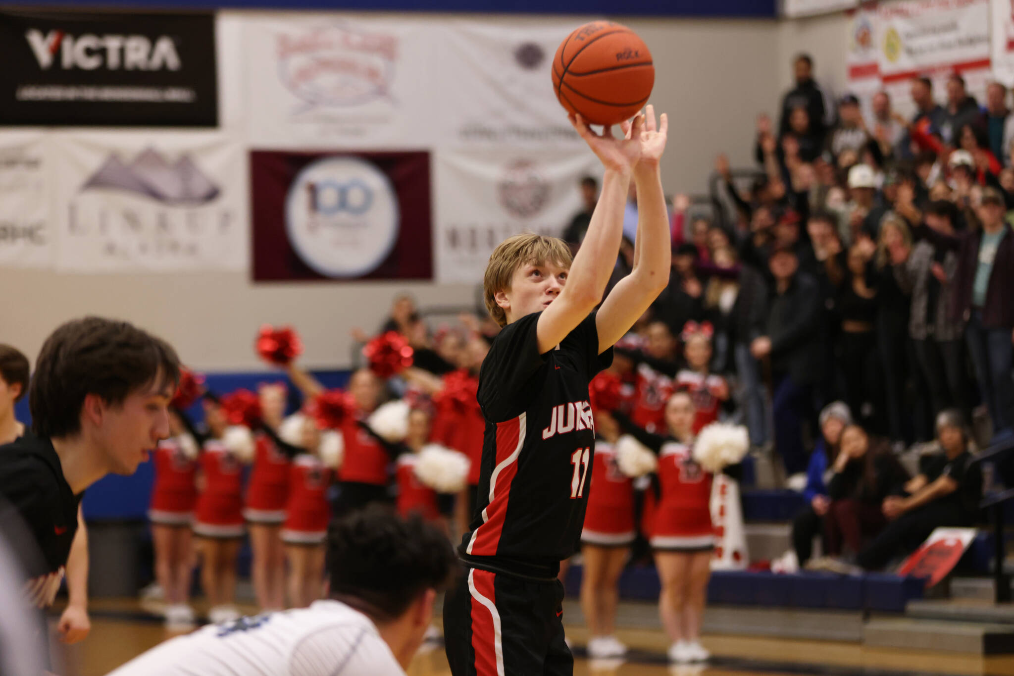 JDHS junior Sean Oliver takes a free throw shot during a game against Thunder Mountain High School on Thursday, Feb. 2. Oliver finished with a total of 20 points against the Crimson Bears’ most recent game against Palmer High School on Friday, Feb. 17. (Ben Hohenstatt / Juneau Empire file)