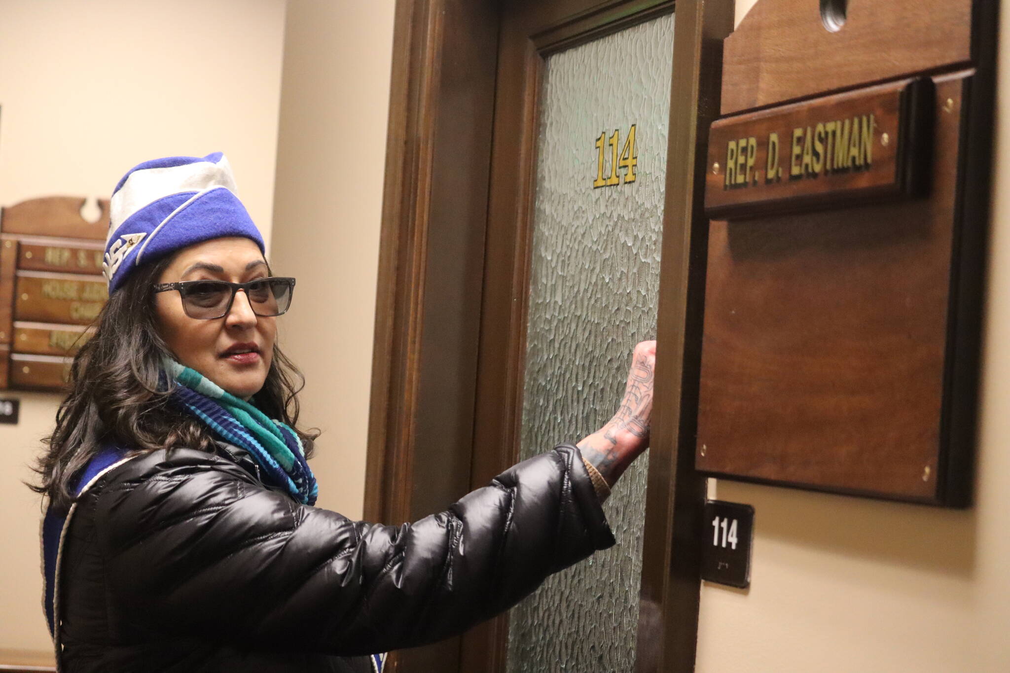 Jamiann Seiltin Hasselquist prepares to lead a group of protesters into the office of state Rep. David Eastman, R-Wasilla, at midday Friday. The protest Hasselquist helped organize was in response to questions Eastman asked during a committee hearing Monday about possible economic benefits of dead absued children. A staff member declined to tell the protesters if Eastman was in his office. (Jonson Kuhn / Juneau Empire)