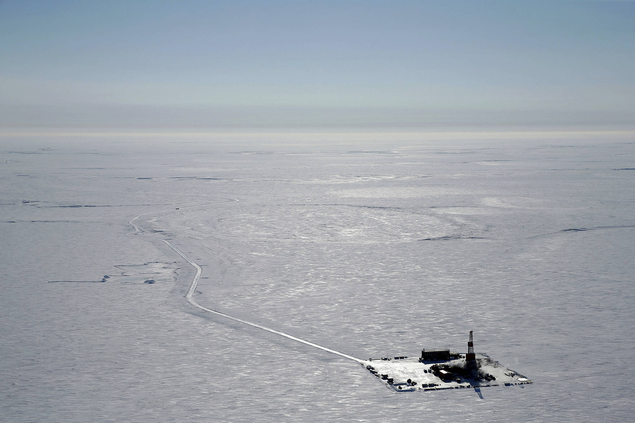 This 2019 aerial photo provided by ConocoPhillips shows an exploratory drilling camp at the proposed site of the Willow oil project on Alaska’s North Slope. The Biden administration is weighing approval of a major oil project on Alaska’s petroleum-rich North Slope that supporters say represents an economic lifeline for Indigenous communities in the region but environmentalists say is counter to Biden’s climate goals. A decision on ConocoPhillips Alaska’s Willow project, in a federal oil reserve roughly the size of Indiana, could come by early March 2023. (ConocoPhillips)