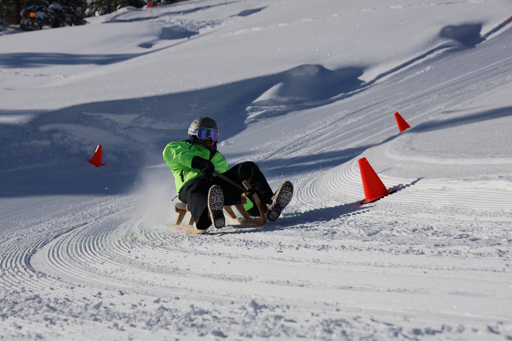 Doug Sanvik rips down a hill on a luge at Eaglecrest Ski Area Saturday morning. (Clarise Larson / Juneau Empire)