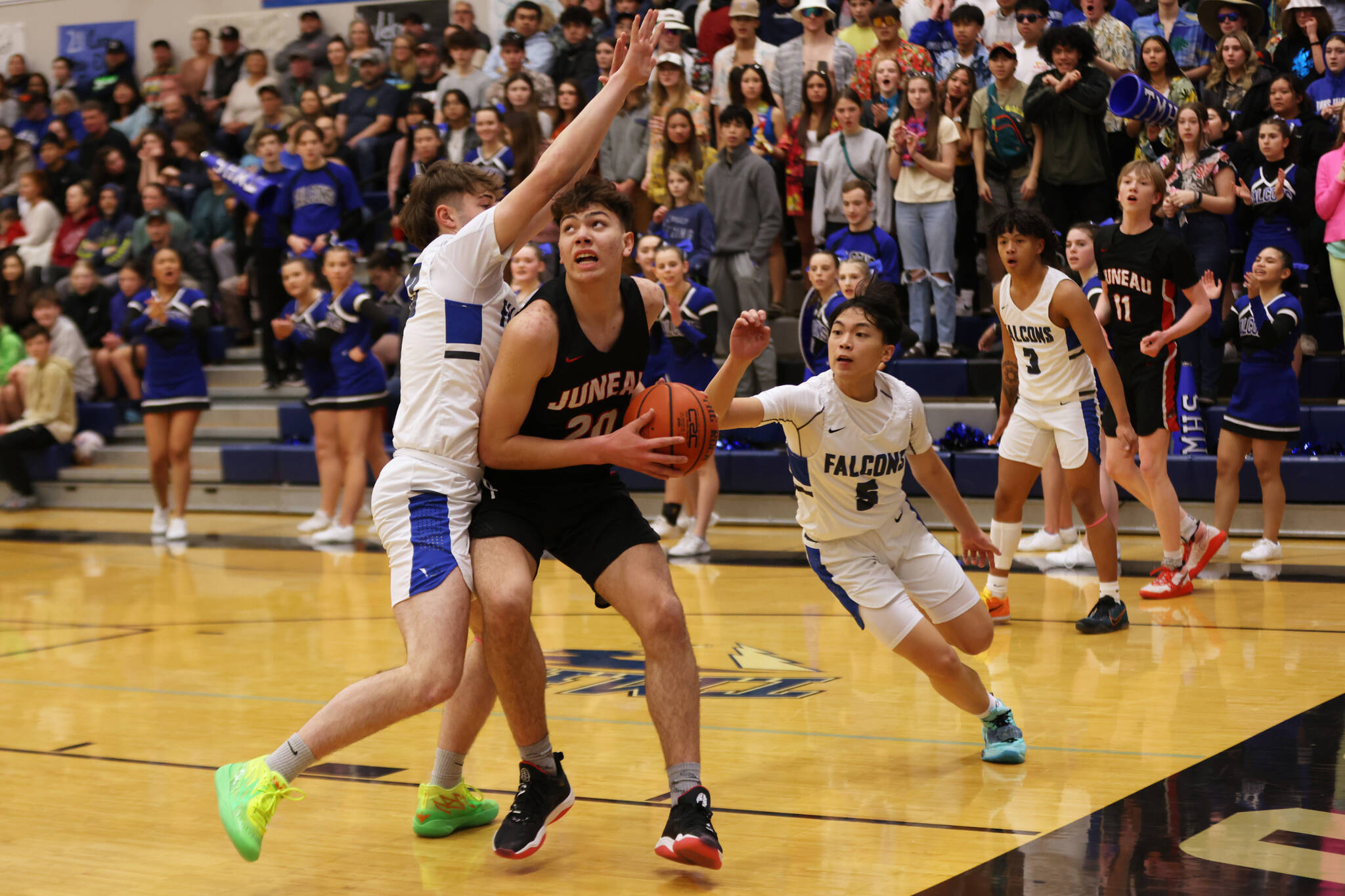 Ben Hohenstatt / Juneau Empire
JDHS senior Orion Dybdahl goes in for a layup against TMHS during a conference game early this season. The two cross-town rivals are set to play games for the Region V Tournament this week.