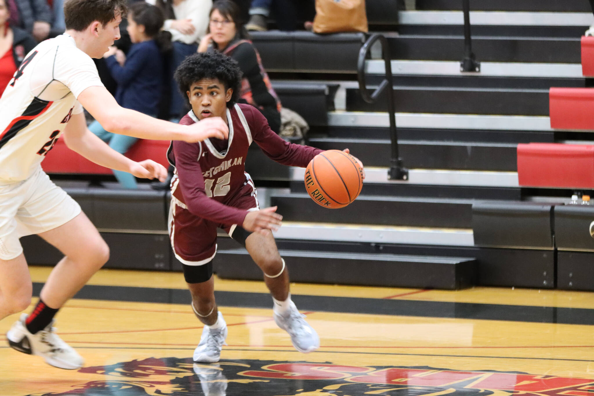 Ketchikan’s JJ Parker takes the ball down court against JDHS in a conference game earlier this season. The two teams are set to face off again for this year’s Region V Tournament. (Jonson Kuhn / Juneau Empire)