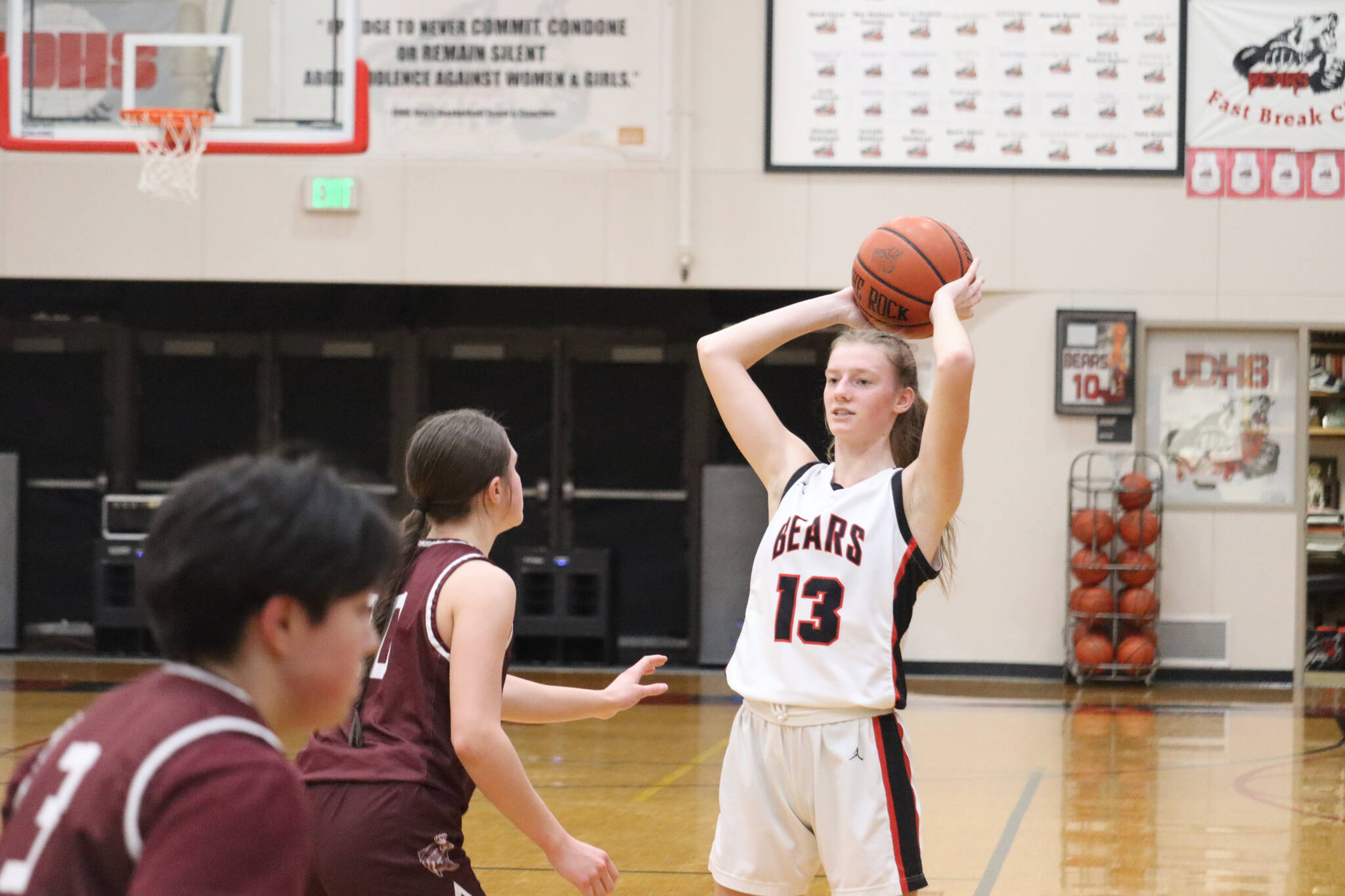 JDHS senior Skylar Tuckwood looks for an open pass against Ketchikan in a conference game from earlier this season. (Jonson Kuhn / Juneau Empire)