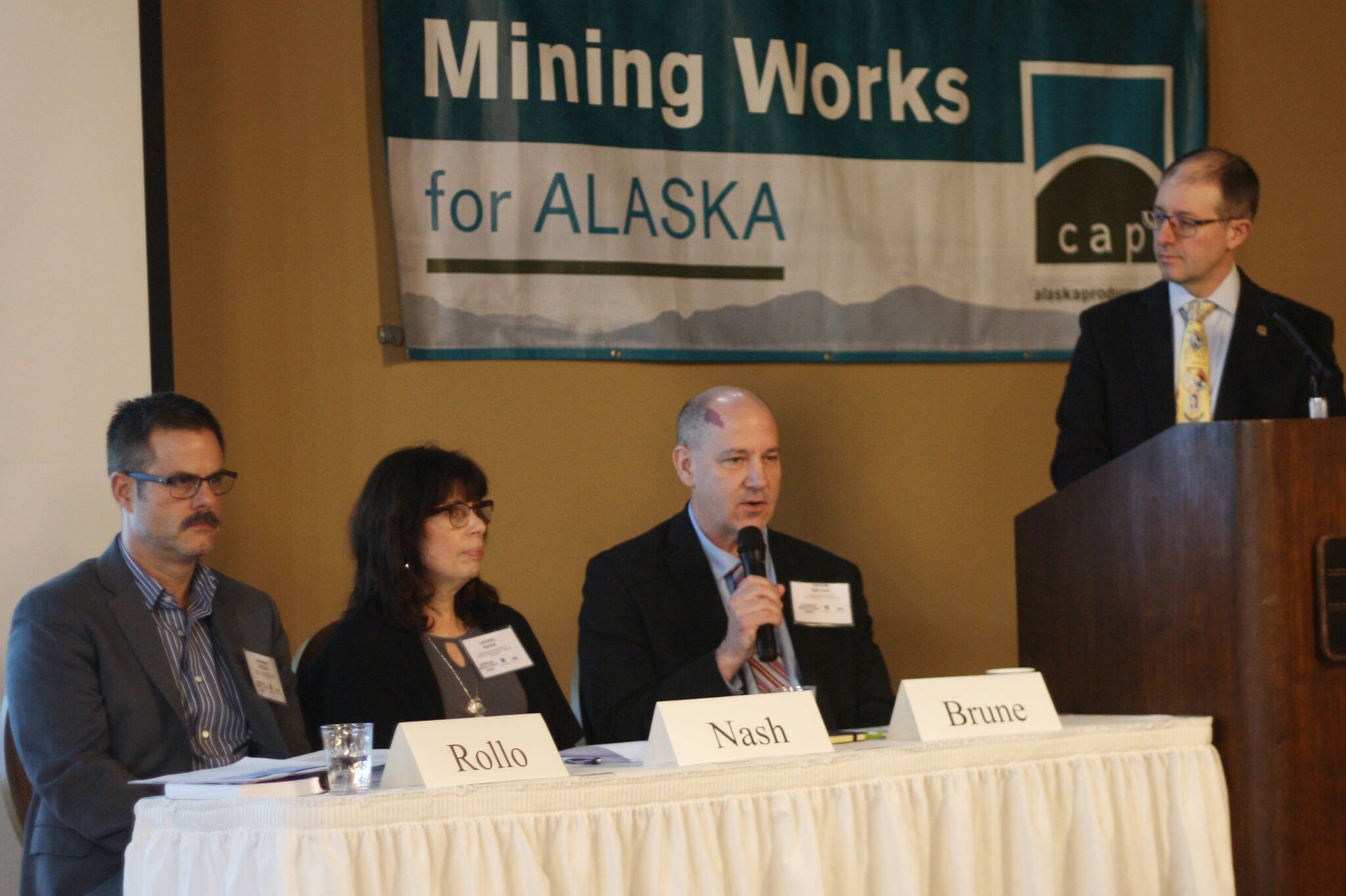 A panel discussion about transboundary mining issues involving Alaska and British Columbia is hosted Tuesday by state Sen. Jesse Kiehl, D-Juneau, during the Juneau Mining Forum conference Tuesday at the Baranof Hotel. Participating in the discussion were Andrew Rollo, left, assistant deputy minister for Energy Mines and Low Carbon Innovation in B.C., Laurel Nash, assistant deputy minister for the Ministry of Environment & Climate Change Strategy in B.C., and Jason Brune, commissioner of the Alaska Department of Environmental Conservation. (Mark Sabbatini / Juneau Empire)