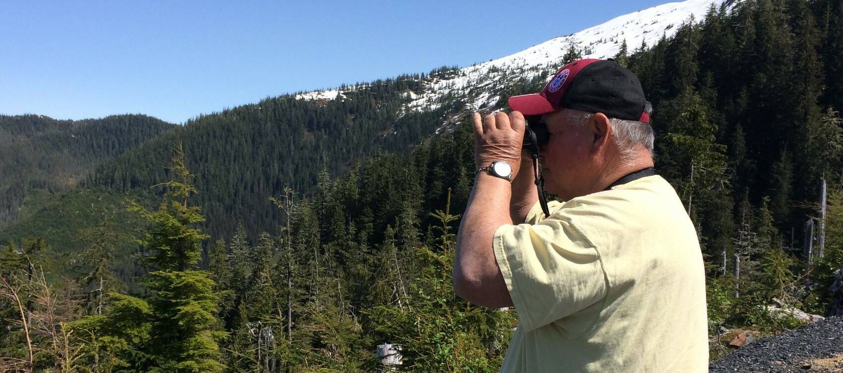 Vivian Faith Prescott / For the Capital City Weekly 
Mickey Prescott looks through binoculars on Wrangell Island.