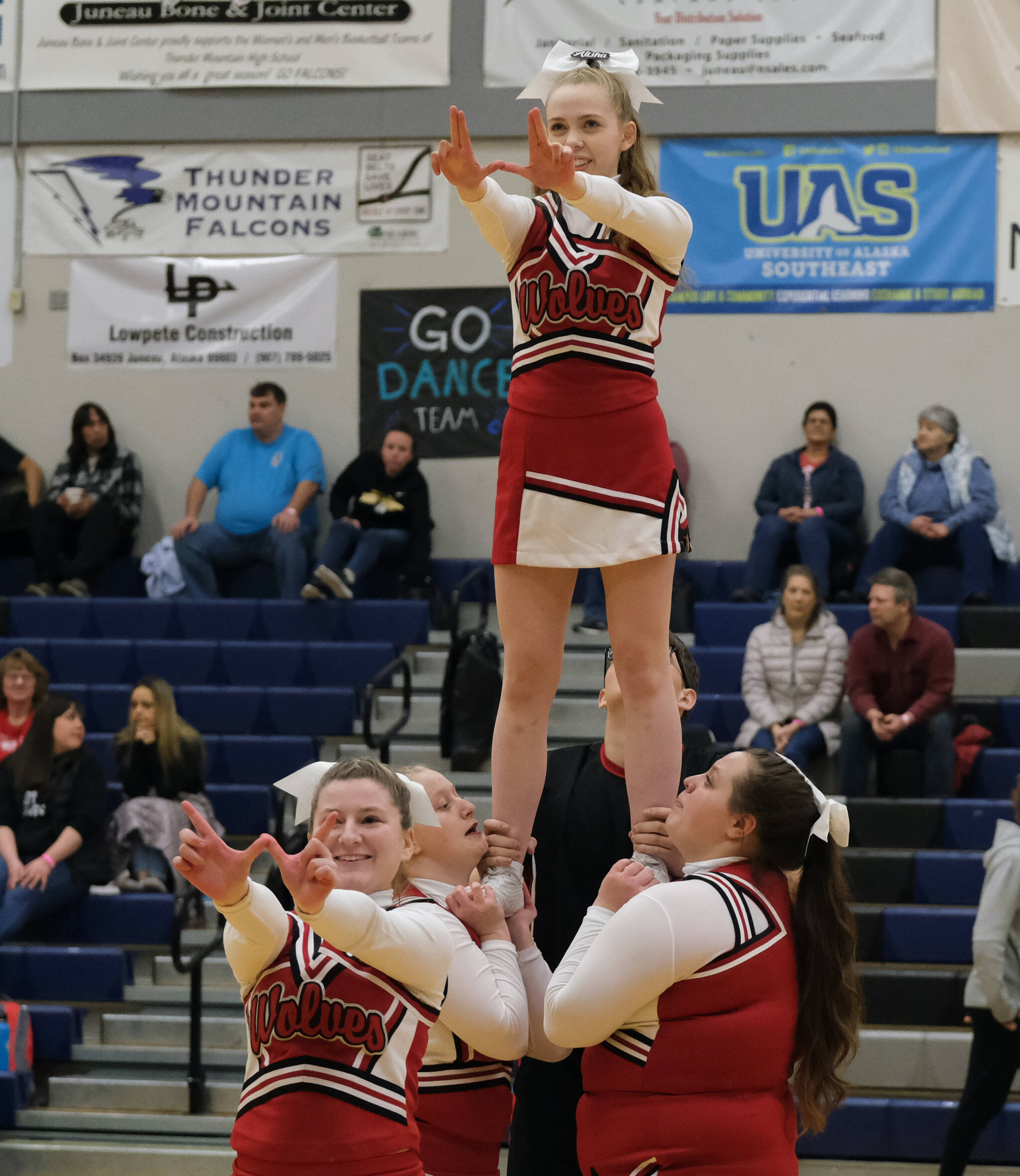 Members of the Wrangell cheer team perform Wednesday at the Region V tournament. (Klas Stolpe / For the Juneau Empire)