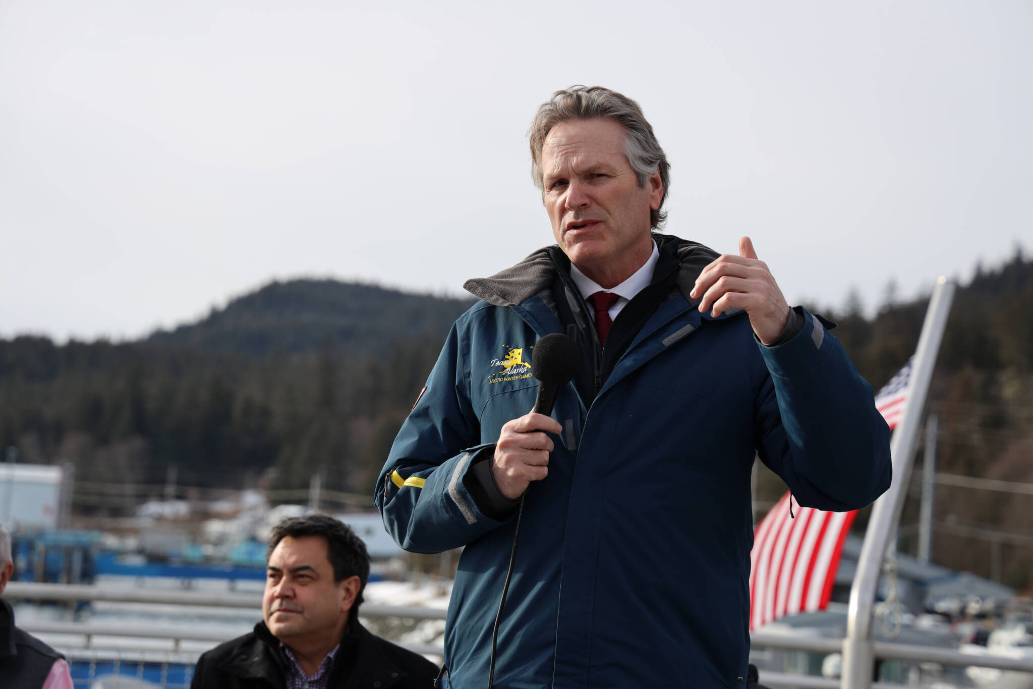 Gov. Mike Dunleavy speaks Thursday afternoon in support of an agreement between the Alaska Department of Transportation and Public Facilities and Goldbelt Inc. to pursue engineering and design services to determine whether it’s feasible to build a new ferry terminal facility in Juneau at Cascade Point. (Clarise Larson / Juneau Empire)