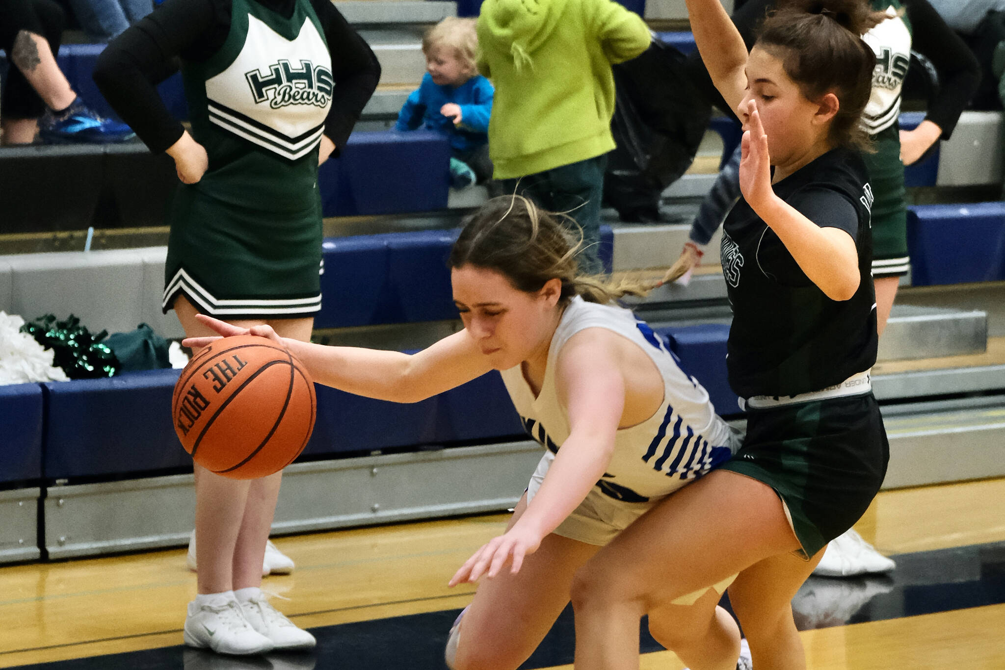 Petersburg junior Bryanna Ratliff is fouled by Haines sophomore Ari’el Godinez Long during the Region V basketball tournament on Thursday. Haines eliminated Petersburg from the tournament 38-16. (Klas Stolpe / For the Juneau Empire)