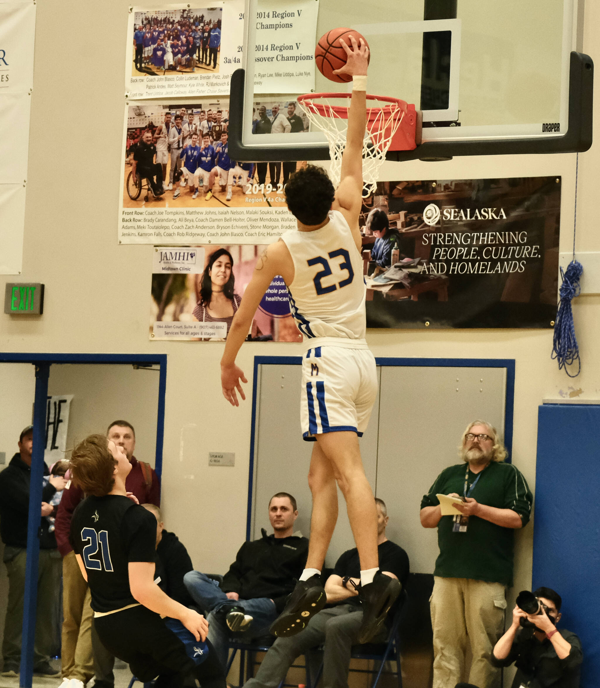 Metlakatla High School senior Shayne Anderson dunks during the Chiefs 42-36 2A Region V Championship game win over the Petersburg Vikings on Friday at Juneau’s Thunder Mountain High School. (Klas Stolpe / For the Juneau Empire)