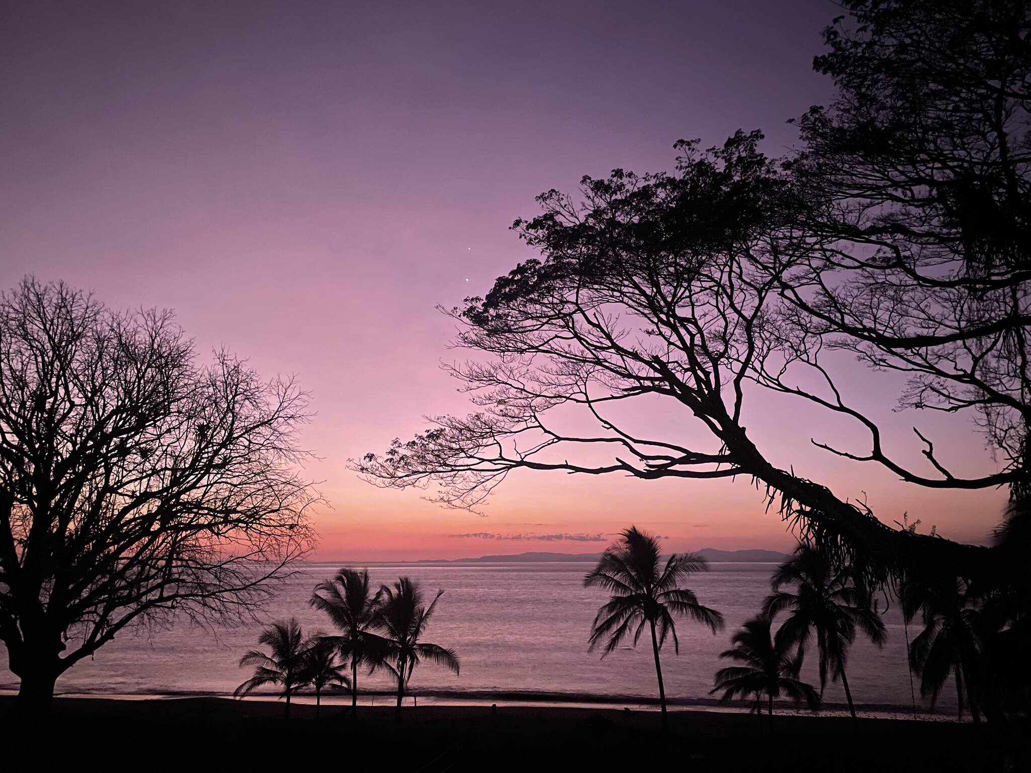 The sun sets over the Pacific Ocean on the west coast of Costa Rica in Central America. (Courtesy Photo / Ned Rozell)