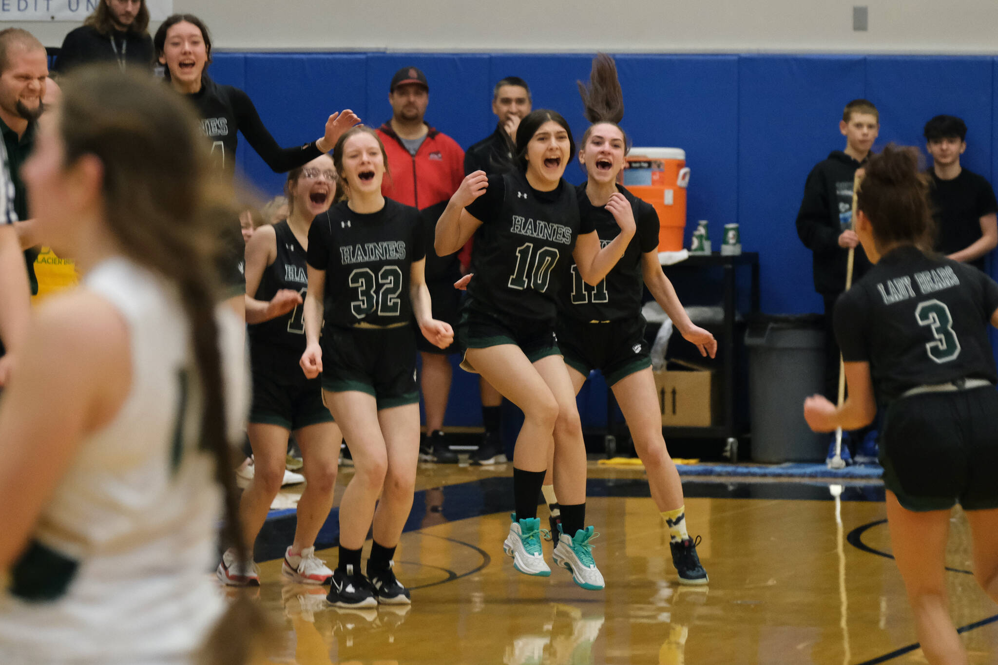 Haines players celebrate their 45-35 win over Craig in the 2A Region V Runner Up game on Saturday at Juneau's Thunder Mountain High School. (Klas Stolpe  / For the Juneau Empire)
