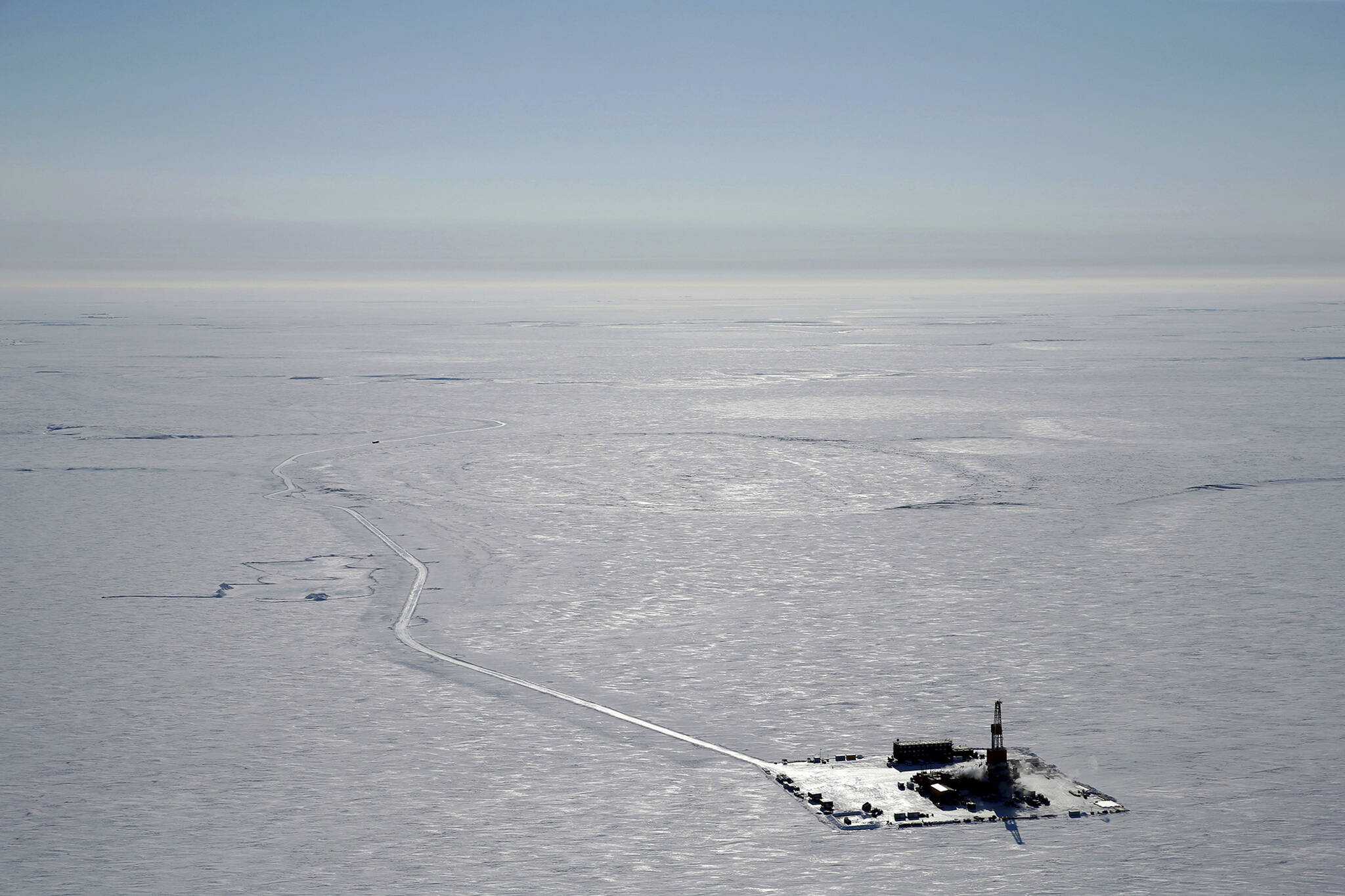 This 2019 aerial photo provided by ConocoPhillips shows an exploratory drilling camp at the proposed site of the Willow oil project on Alaska’s North Slope. President Joe Biden will prevent or limit oil drilling in 16 million acres of Alaska and the Arctic Ocean, an administration official said on Sunday, March 12, 2023. The expected announcement comes as regulators prepare to announce a final decision on the controversial Willow project. (ConocoPhillips)