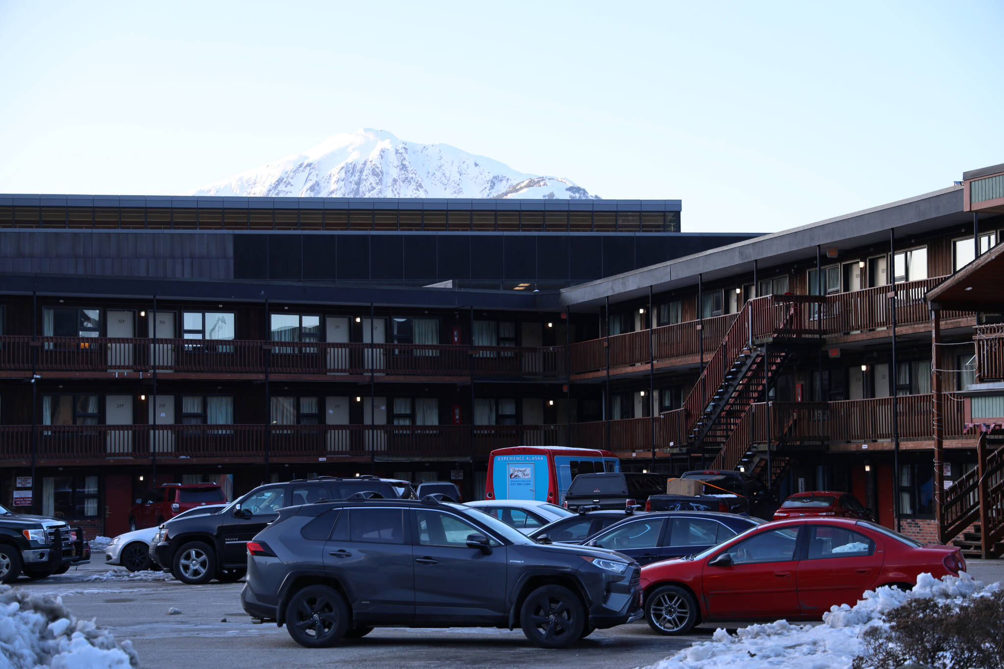 Clarise Larson / Juneau Empire 
Cars fill the parking lot outside of Driftwood Lodge in downtown Juneau Monday morning. The Central Council of the Tlingit and Haida Indian Tribes of Alaska recently announced it’s purchase of the site.