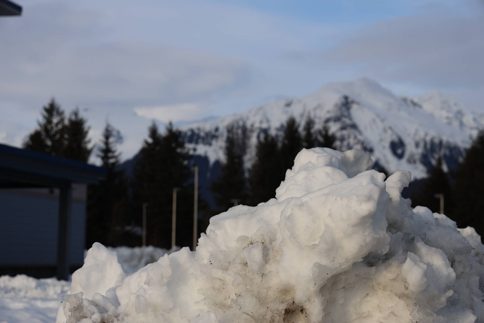 This snow pile outside Thunder Mountain High School is expected grow. The National Weather Service in Juneau issued a winter weather advisory starting Wednesday morning and running through Thursday morning. (Clarise Larson / Juneau Empire)
