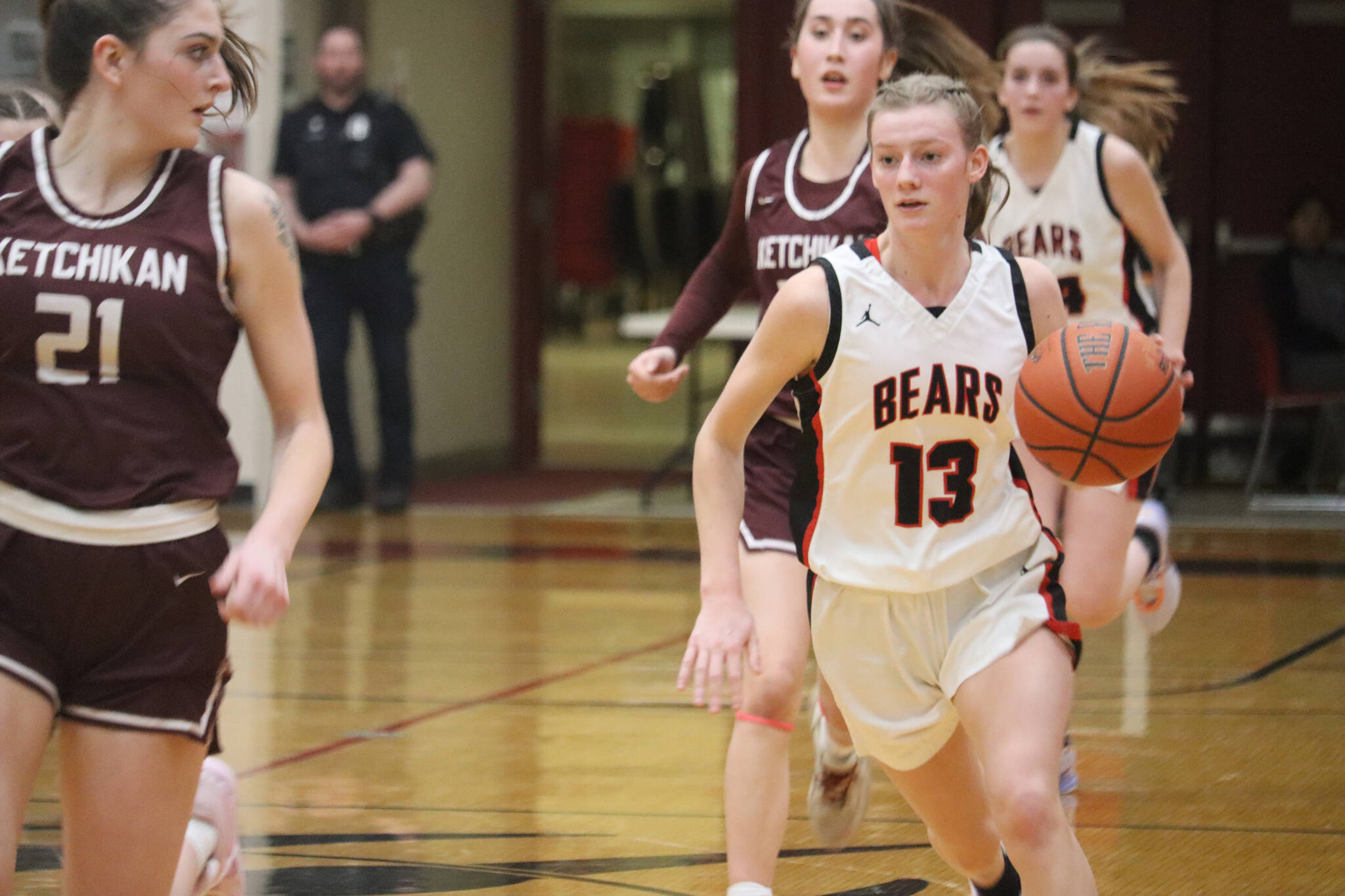 Skylar Tuckwood sprints down the court against Ketchikan High School on Friday, Feb. 24 at JDHS. Though it’s a game the Crimson Bears would ultimately lose, Tuckwood led her team for a total of 19 points. (Jonson Kuhn / Juneau Empire File)