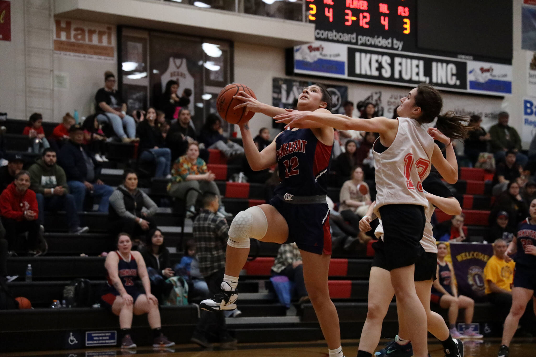 Yakutat’s Trinity Jackson goes up for a shot Monday afternoon in a game against Kake during the Juneau Lions Club 74th Gold Medal Basketball Tournament at the Juneau-Douglas High School: Yadaa.at Kalé gymnasium. Yakutat prevailed against Kake 69-33. (Clarise Larson / Juneau Empire)