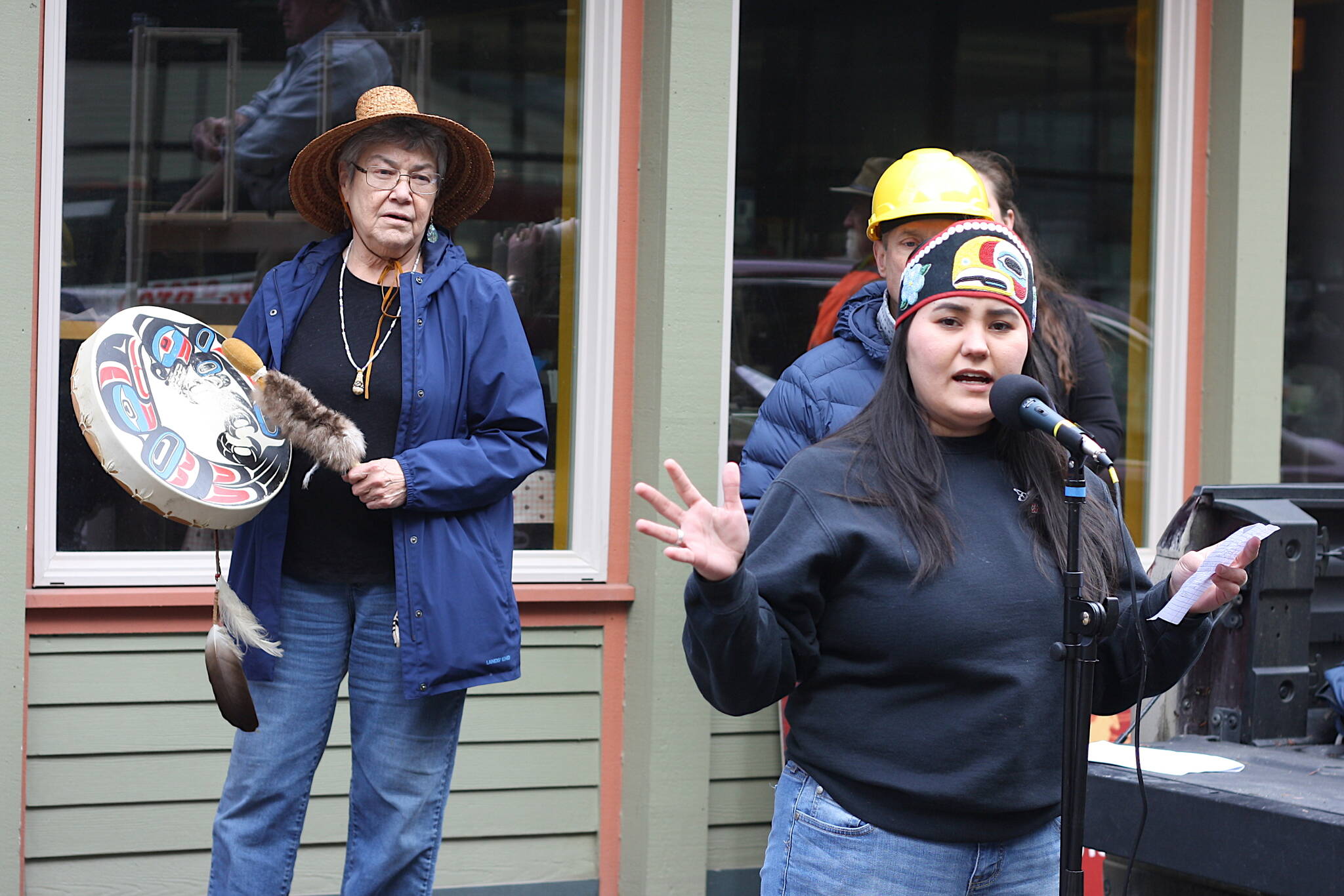 Rebekah Contreras, right, and Kashudoha Wanda Culp, both Hoonah residents, talk about the impacts of cruise ship tourism and other activities that are having climate and environmental impacts in their community during a climate change protest in downtown Juneau at midday Tuesday. (Mark Sabbatini / Juneau Empire)