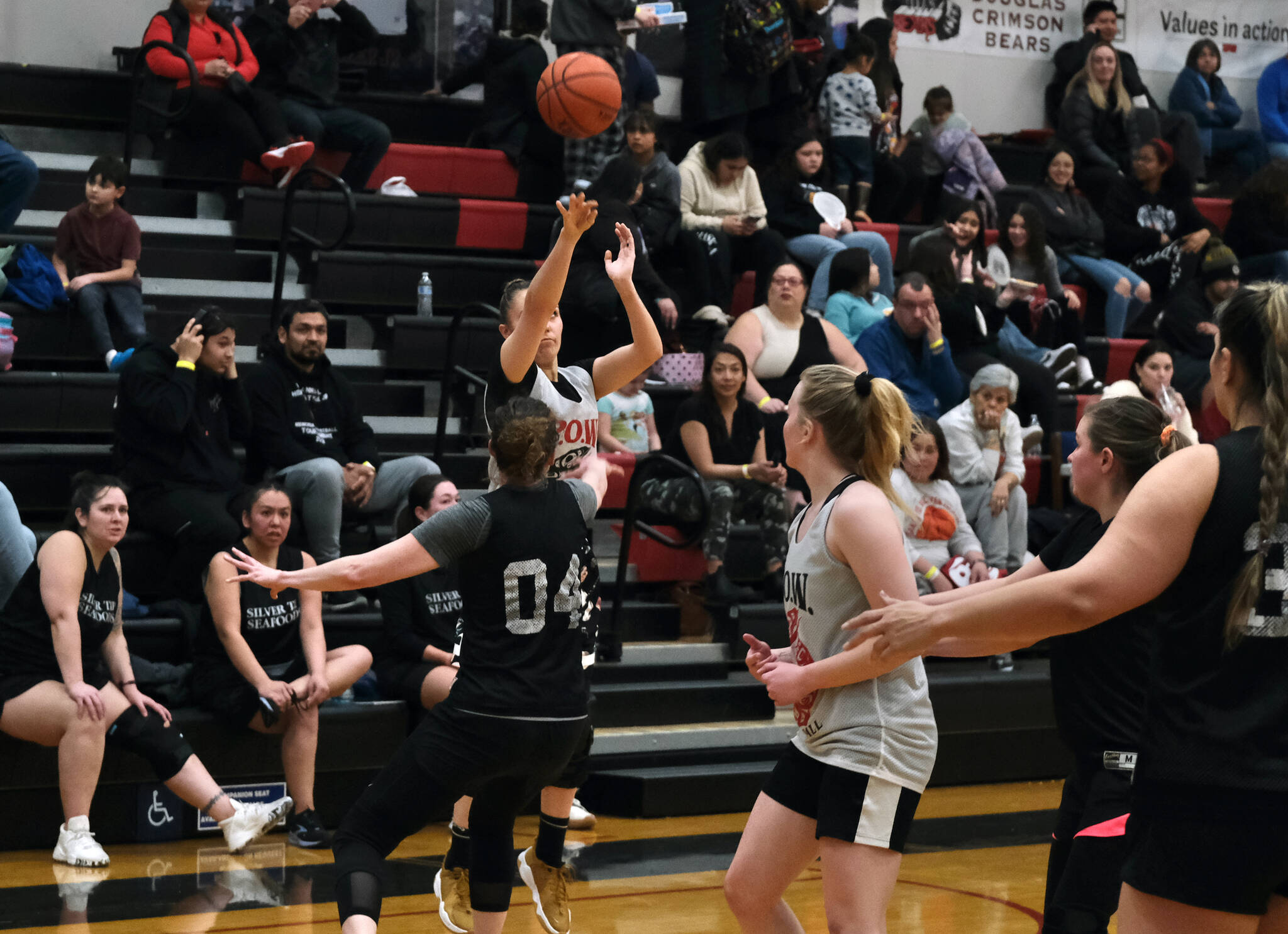 Prince of Wales’ Cassi Williams hits one of her five three point shots in POW’s win over Sitka at the Gold Medal tournament, Tuesday, March 21, in the Juneau-Douglas High School: Yadaa.at Kalé gymnasium.