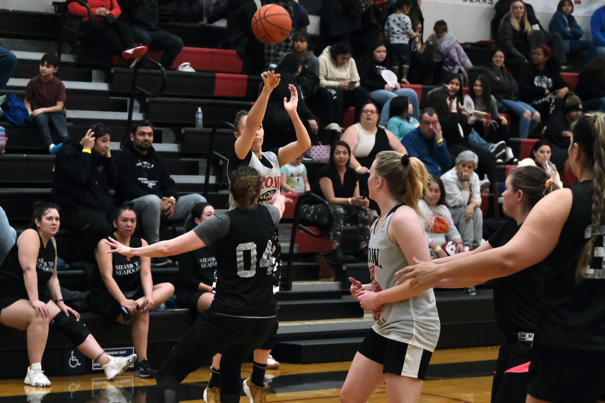 Prince of Wales’ Cassi Williams hits one of her five three point shots in POW’s win over Sitka at the Gold Medal tournament, Tuesday, March 21, in the Juneau-Douglas High School: Yadaa.at Kalé gymnasium.
