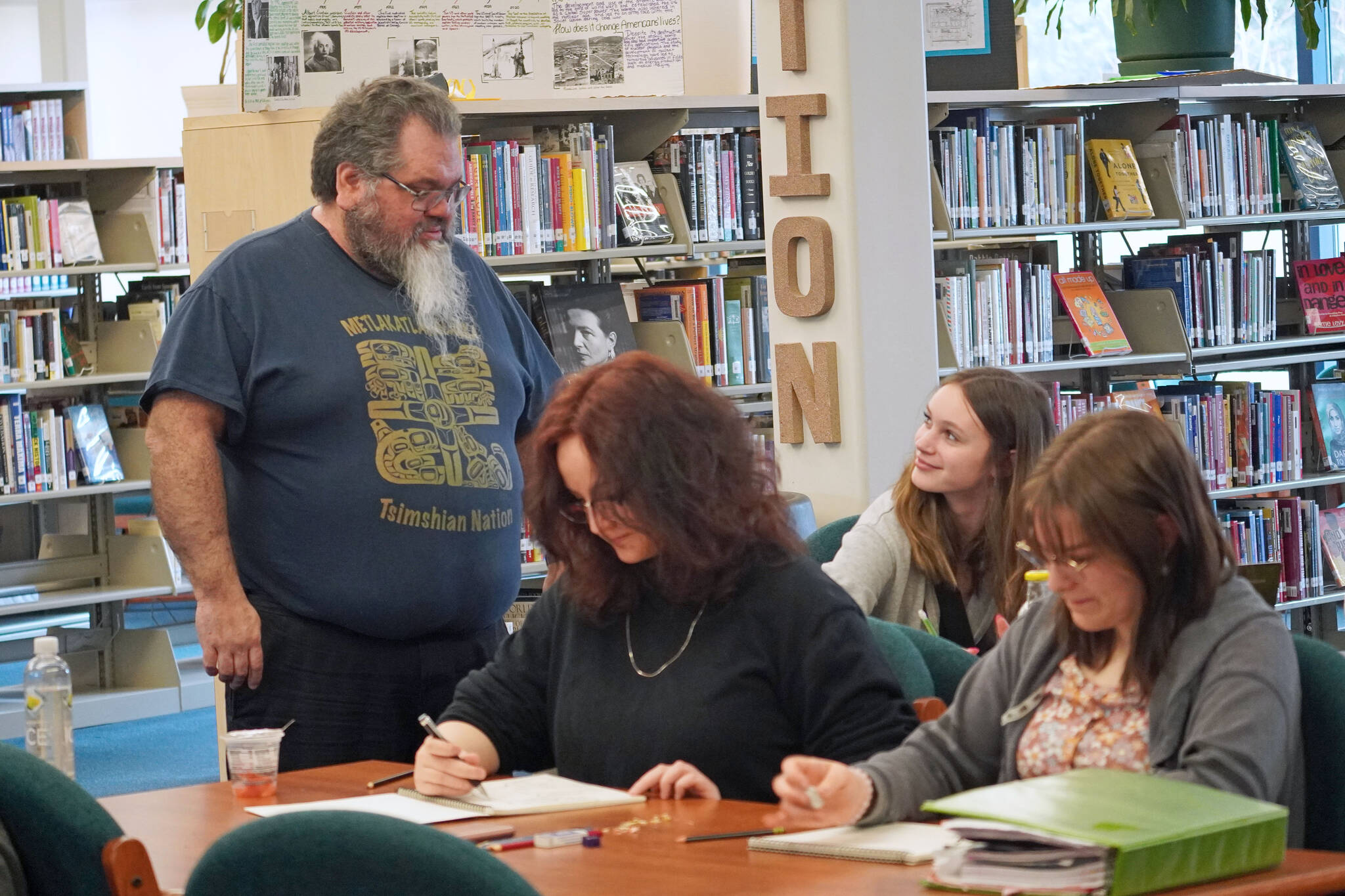 Lucrezia Affatato and Aeryn Locks (left and right) draw while Ella Orsborn(center) receives feedback from Abel Ryan. (Courtesy Photo / David Sheakley-Early)
