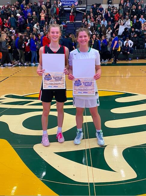 JDHS Skylar Tuckwood and Colony’s Hailee Clark pose for a photo after being named Player of the Game on Tuesday at this years ASAA state competition in Anchorage. (Courtesy Photo / Tanya Nizich)