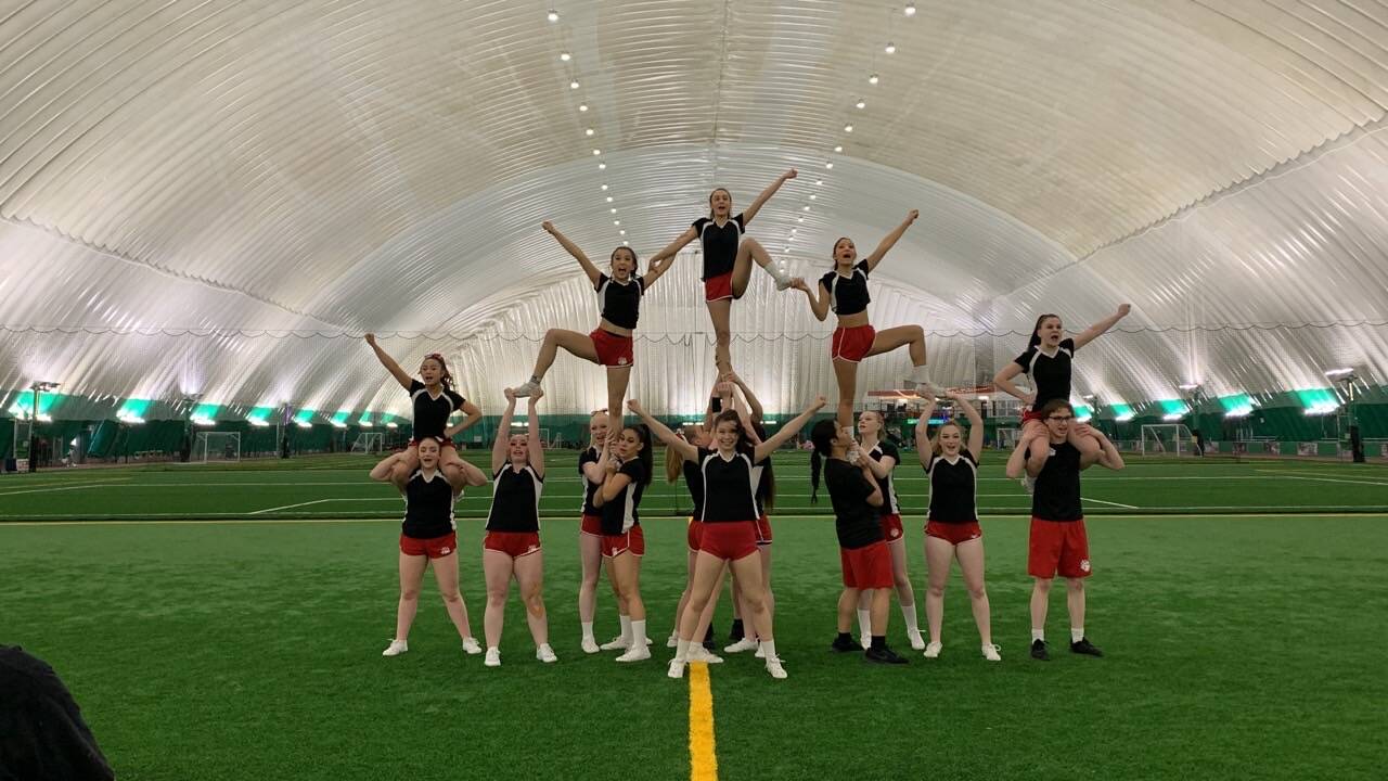 Courtesy Photo / Carlene Nore 
JDHS cheer team competes at this year’s ASAA State competition in Anchorage at the Alaska Airlines Center.