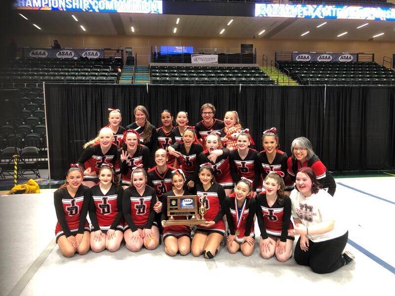 Courtesy Photo / Carlene Nore 
JDHS cheer team poses for a photo at the 2023 ASAA State Championship competition where they took first place for a third straight year.