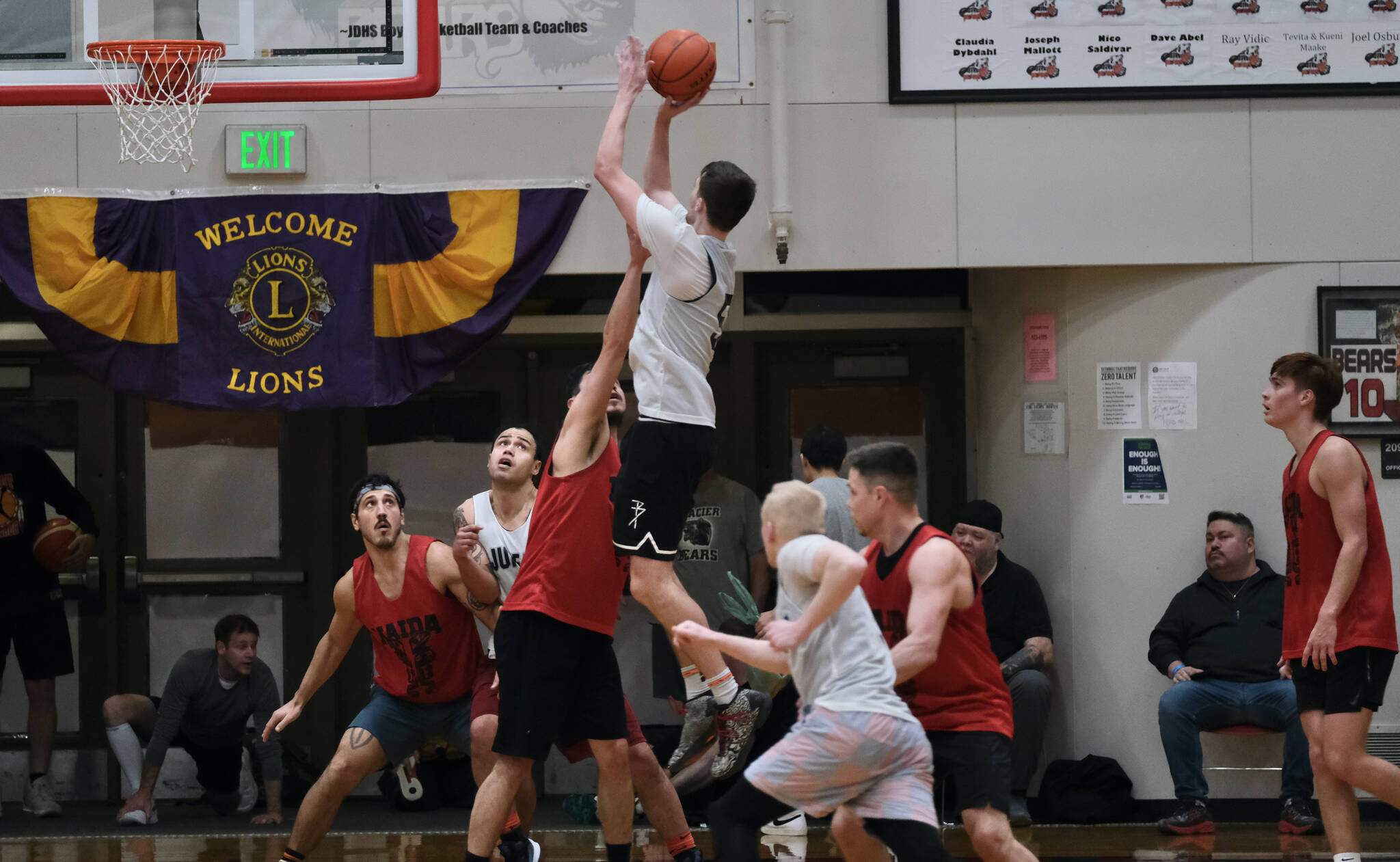 Juneau’s Kaleb Tompkins shoots against Hydaburg Thursday night during a Gold Medal B Bracket contest that secure Juneau a spot in the championship game. (Klas Stolpe / For the Juneau Empire)