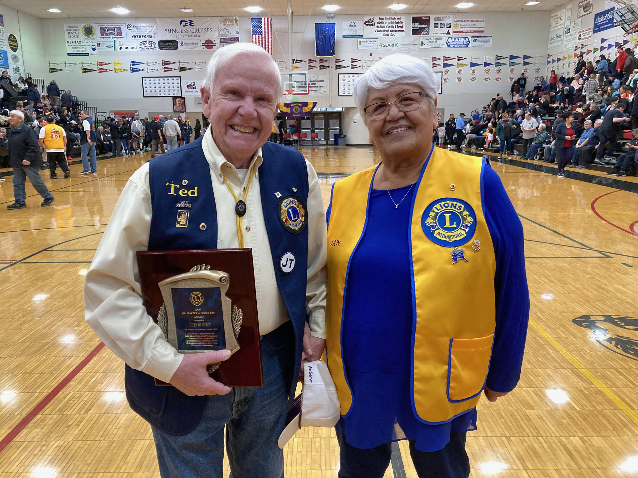Ted Burke and wife Jan pose for a photo at the Gold Medal Basketball Tournament on Saturday. Burke was the recipient of the Dr. Walter Soboleff Award. (Klas Stolpe/For the Juneau Empire)